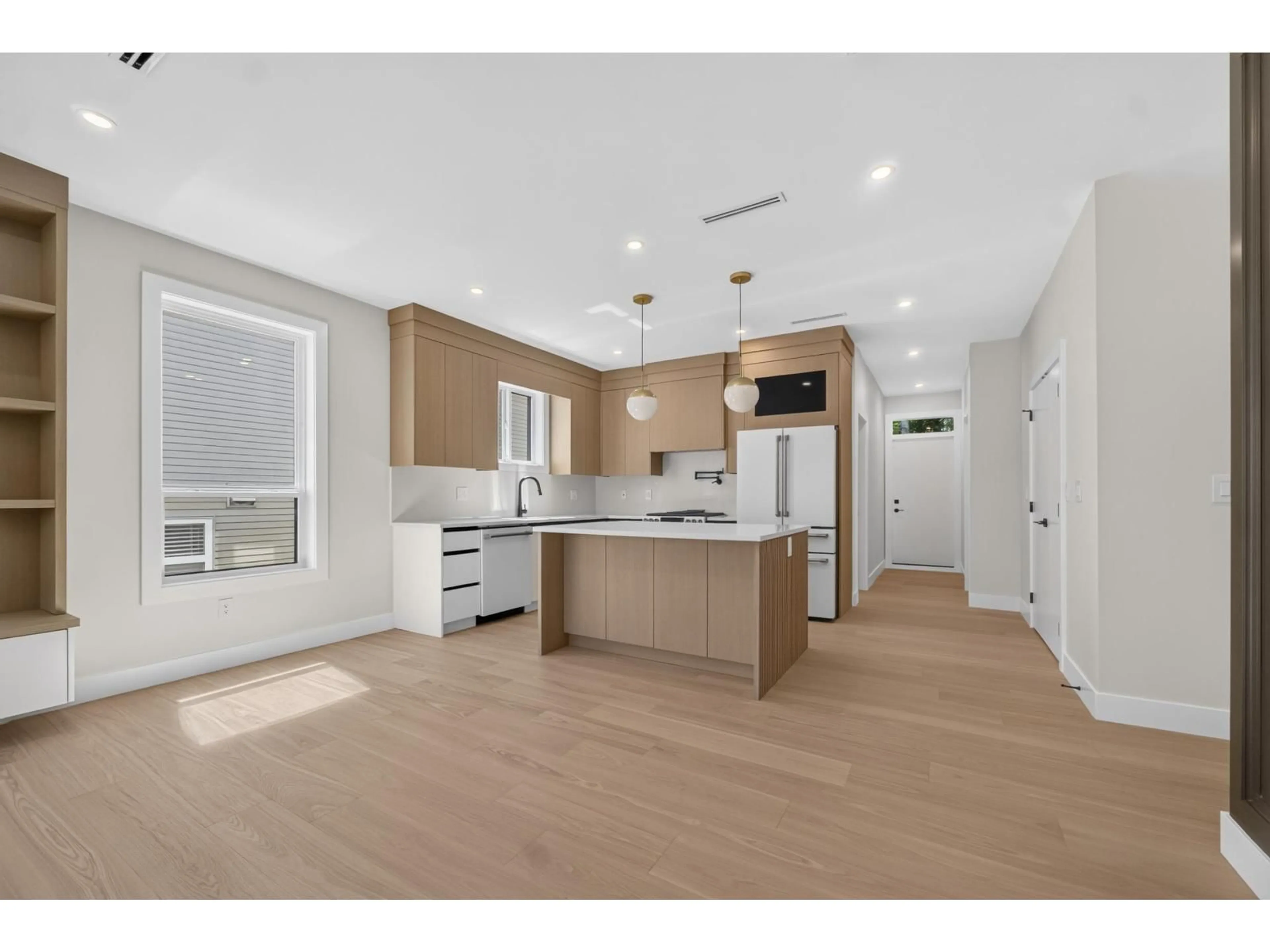 Open concept kitchen, wood/laminate floor for 7791 146 STREET, Surrey British Columbia V2S2T6
