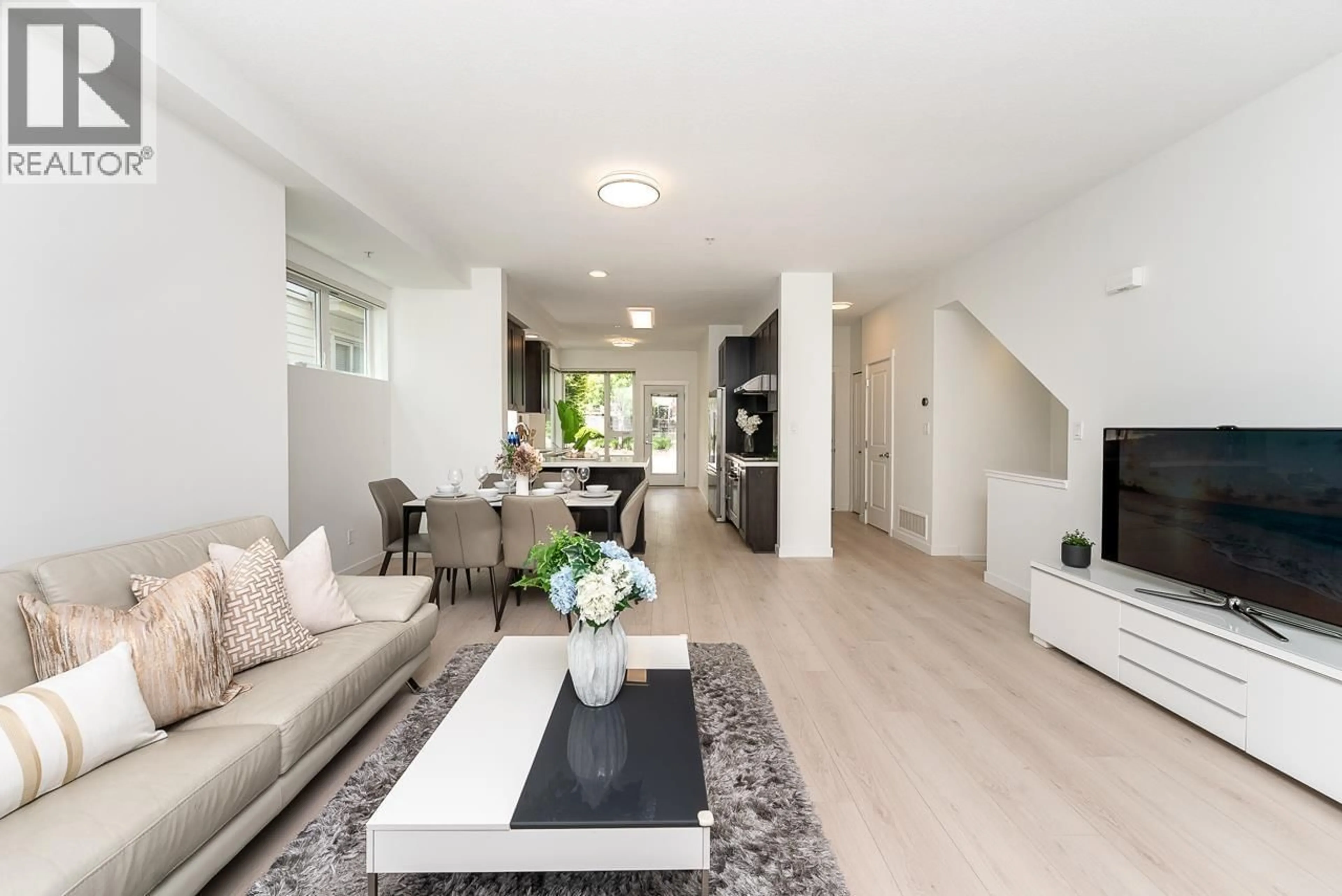 Living room with furniture, unknown for 3187 KENT AVENUE NORTH, Vancouver British Columbia V5S4Y1