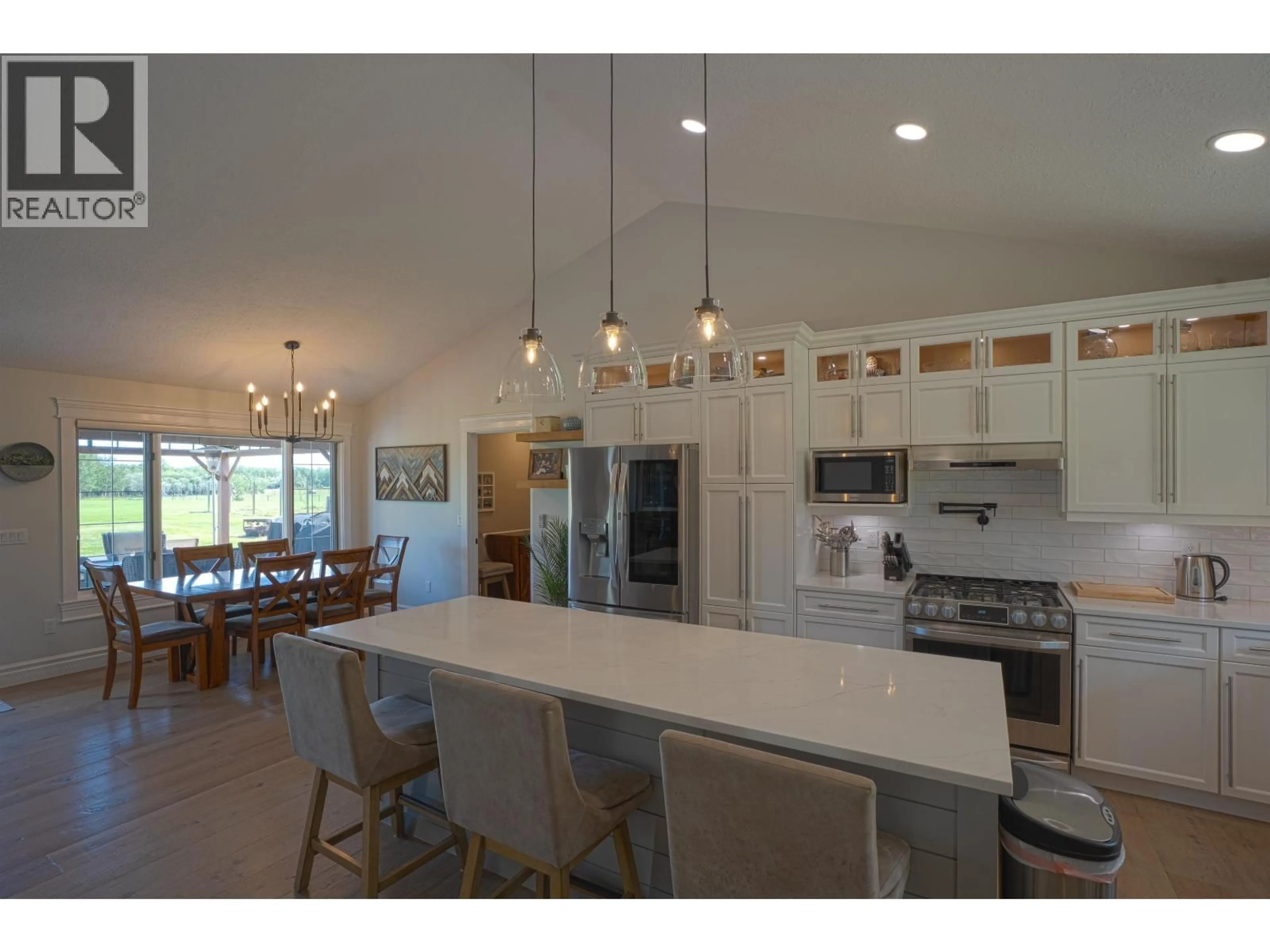 Open concept kitchen, ceramic/tile floor for 10583 86 STREET, Fort St. John British Columbia V1J8E4