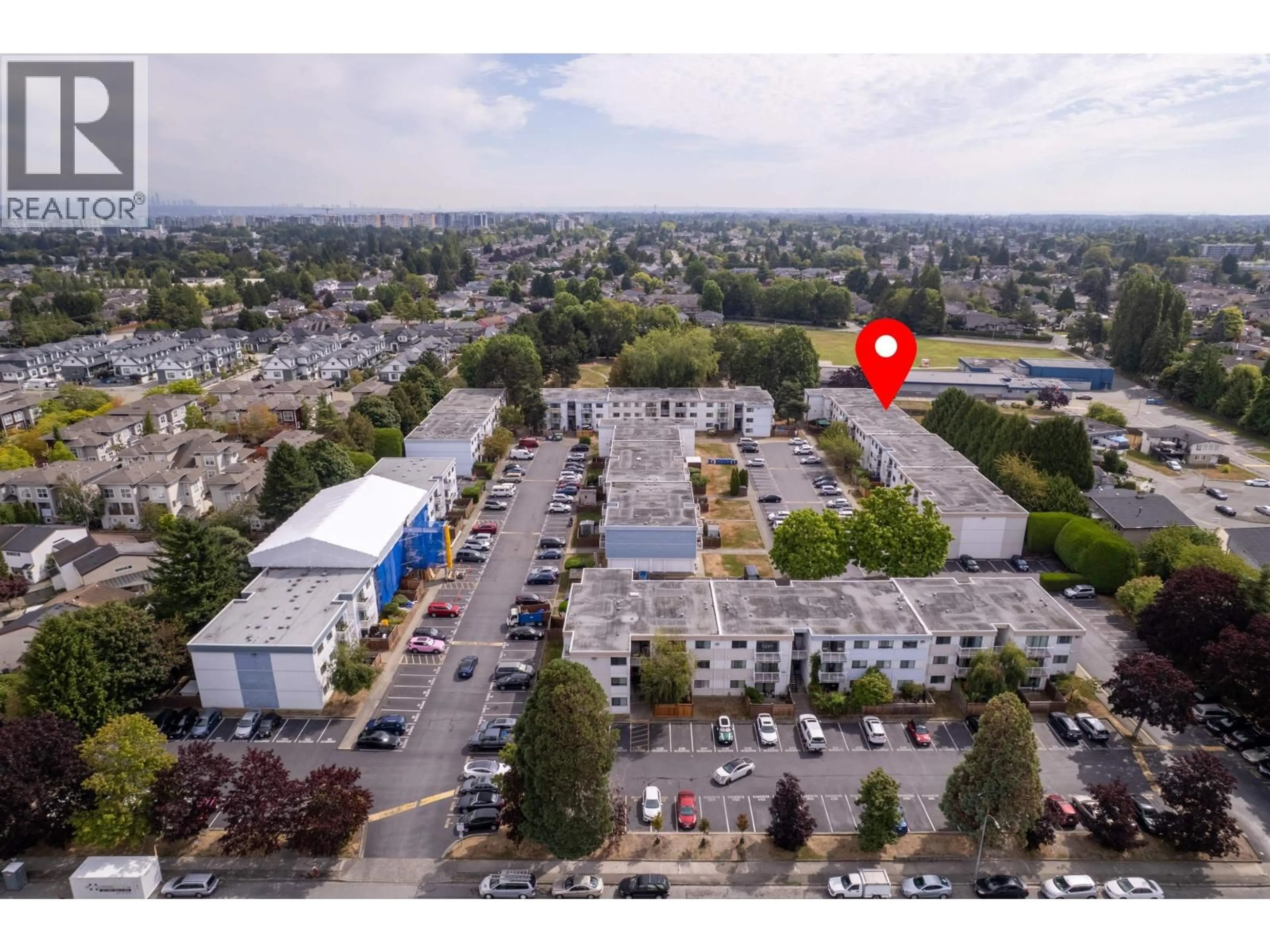 A pic from outside/outdoor area/front of a property/back of a property/a pic from drone, street for 205 - 7240 LINDSAY ROAD, Richmond British Columbia V7C3M6