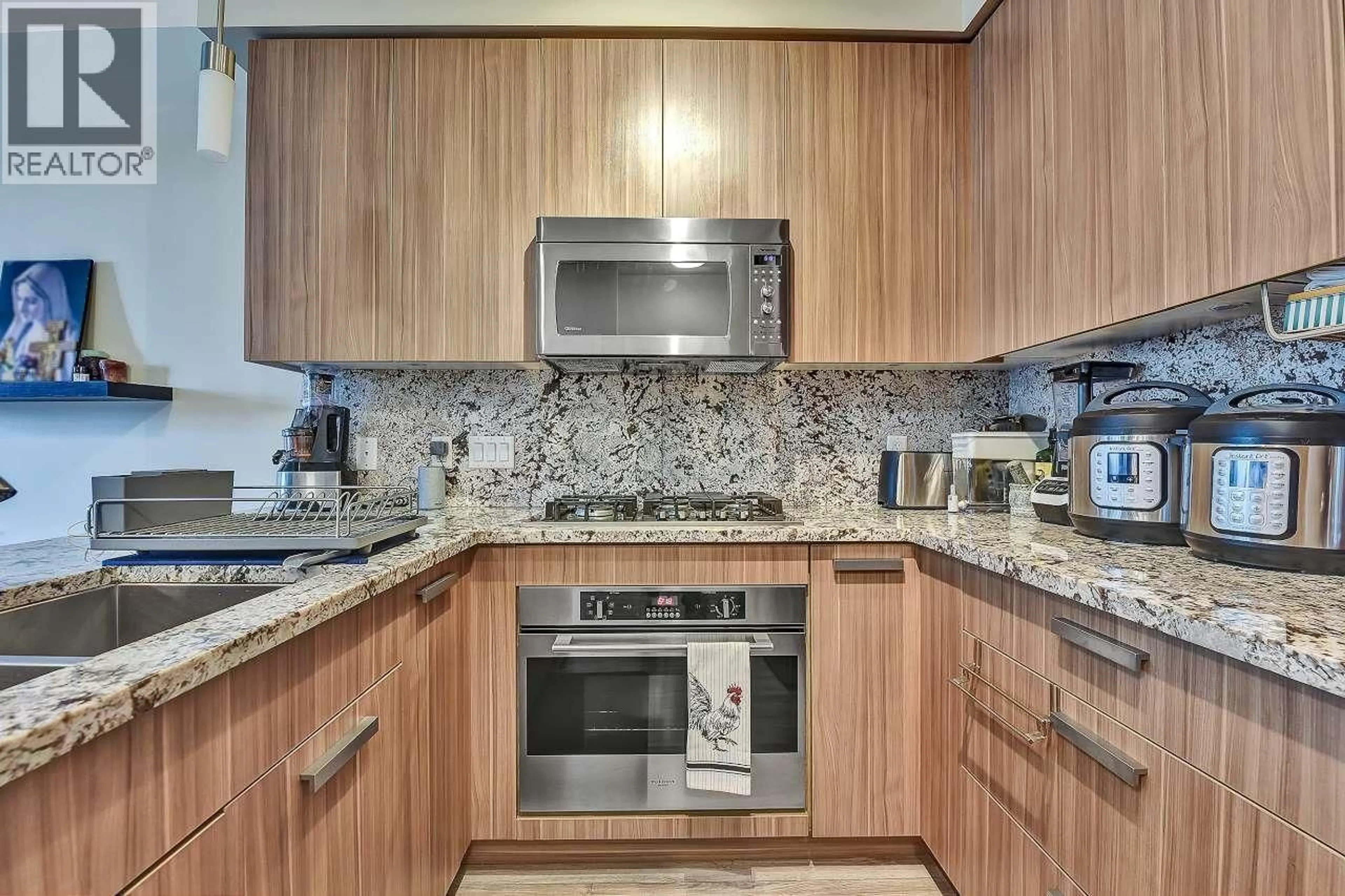 Standard kitchen, ceramic/tile floor for 203 - 4307 HASTINGS STREET, Burnaby British Columbia V5C2J7