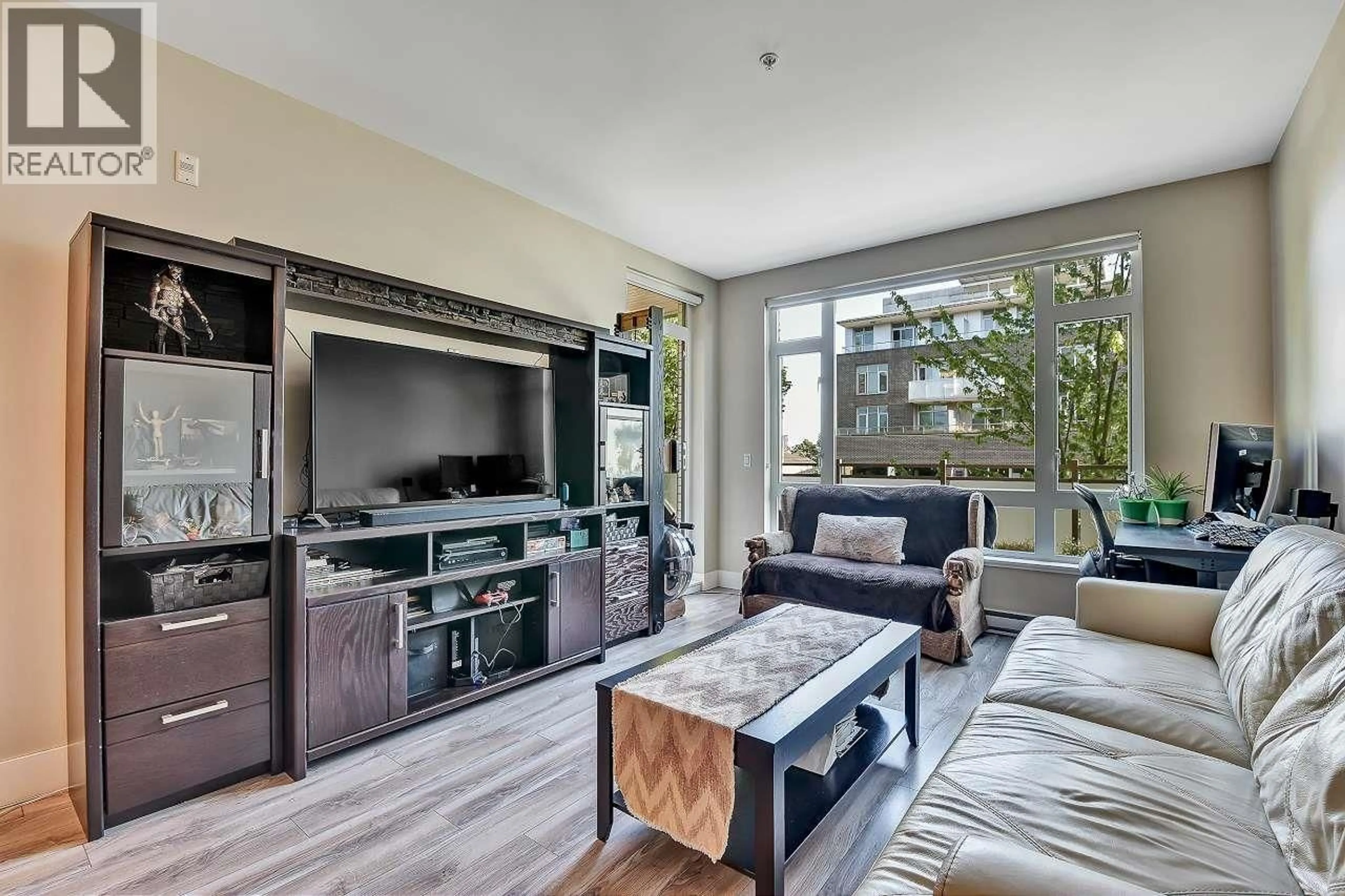 Living room with furniture, unknown for 203 - 4307 HASTINGS STREET, Burnaby British Columbia V5C2J7