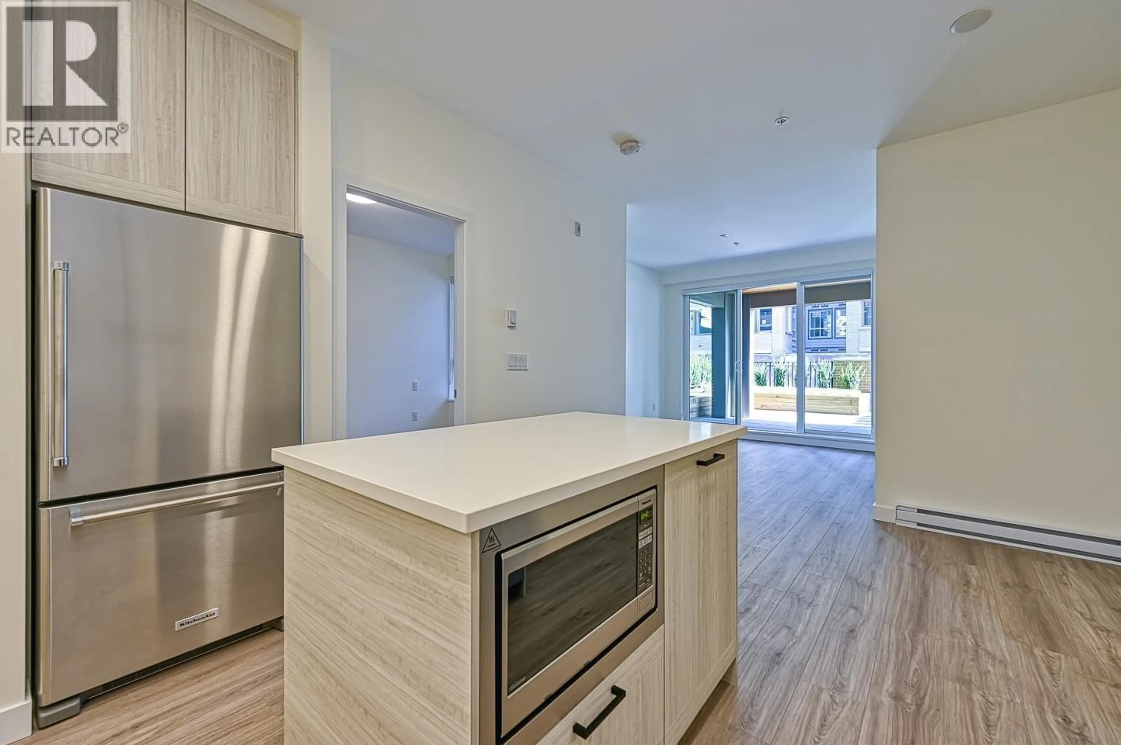Open concept kitchen, unknown for 106 - 7133 14 AVENUE, Burnaby British Columbia V3N0H5