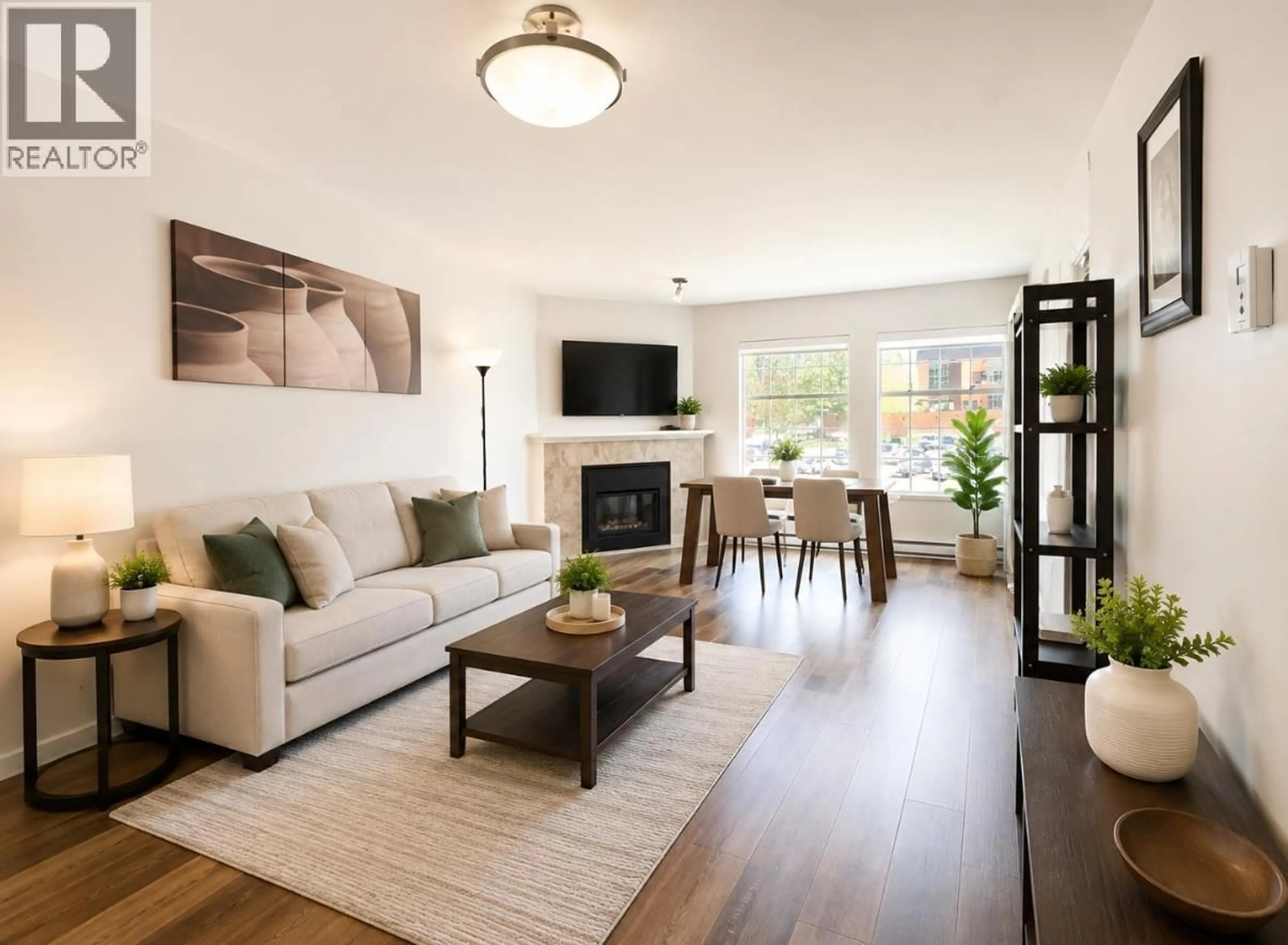 Living room with furniture, wood/laminate floor for 303 - 2973 BURLINGTON DRIVE, Coquitlam British Columbia V3B6X1