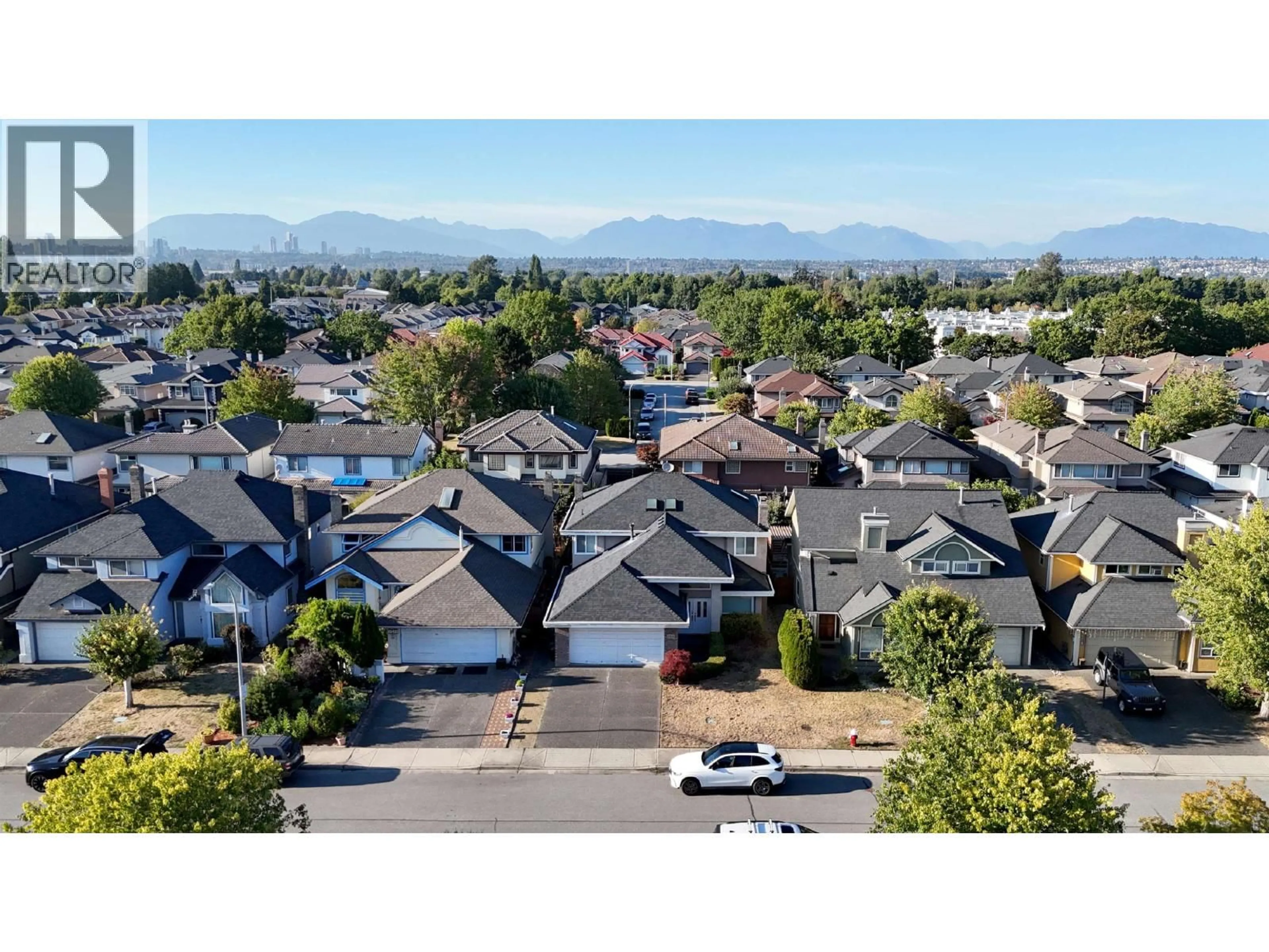 A pic from outside/outdoor area/front of a property/back of a property/a pic from drone, mountain view for 12431 HARRISON AVENUE, Richmond British Columbia V6M4M3