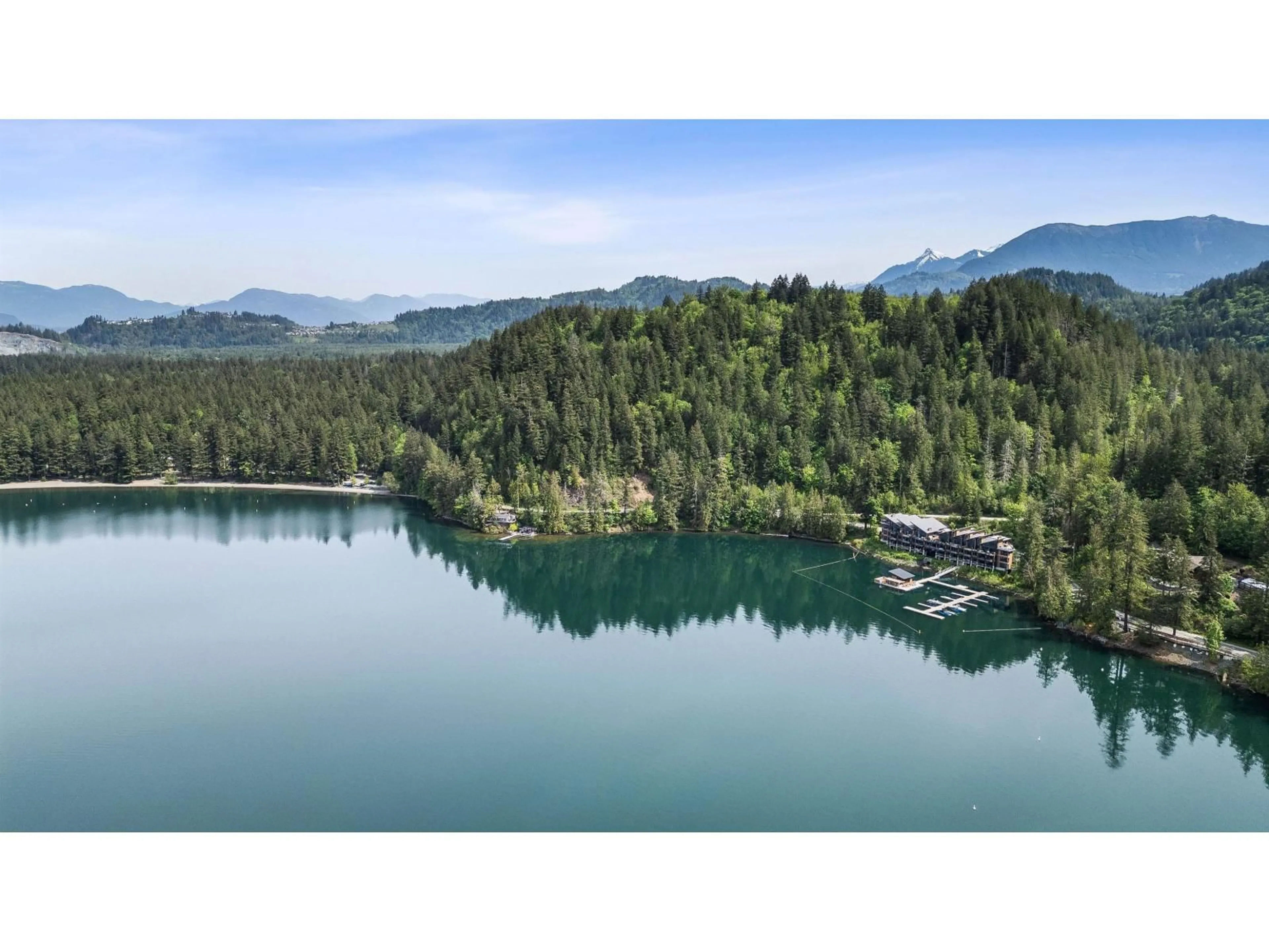 A pic from outside/outdoor area/front of a property/back of a property/a pic from drone, water/lake/river/ocean view for 205 - 3175 COLUMBIA VALLEY ROAD, Cultus Lake British Columbia V2R6C2