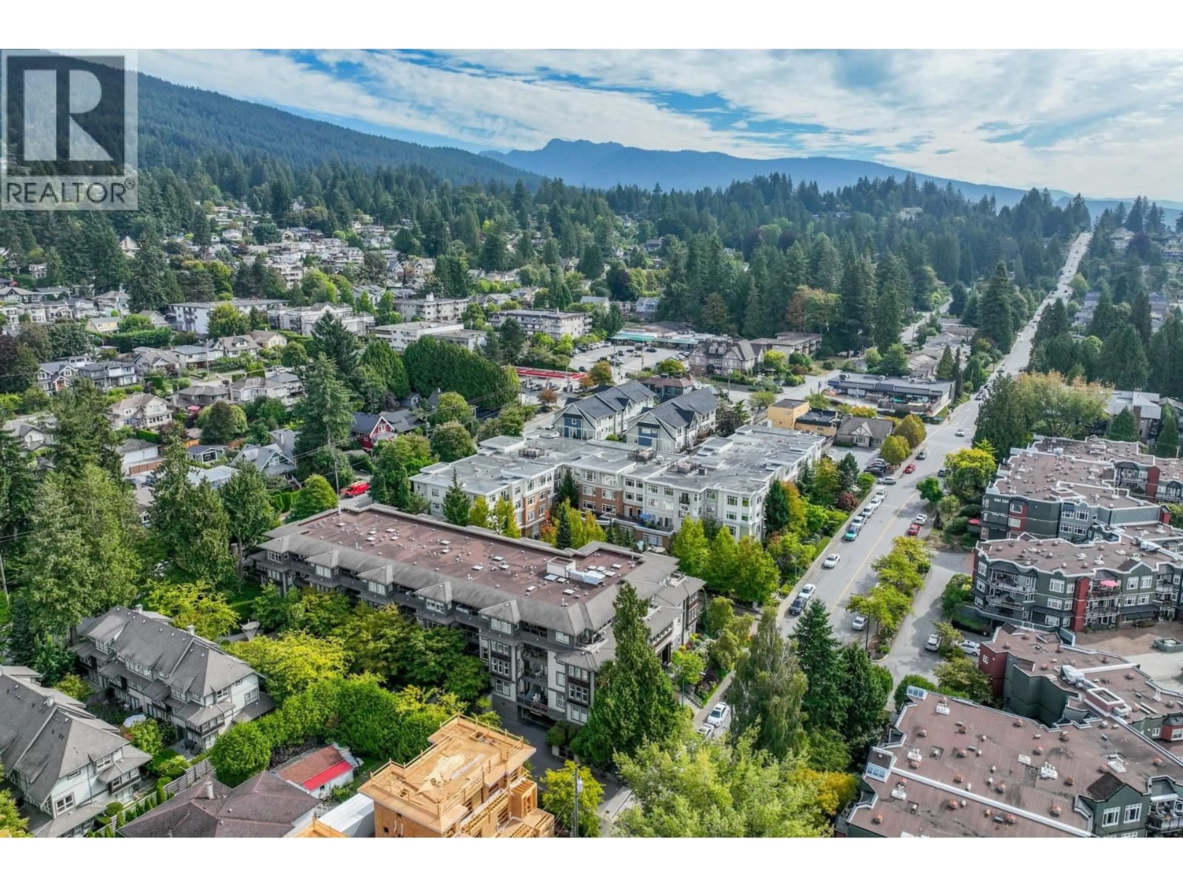 A pic from outside/outdoor area/front of a property/back of a property/a pic from drone, mountain view for 206 - 188 29TH STREET, North Vancouver British Columbia V7N0A2