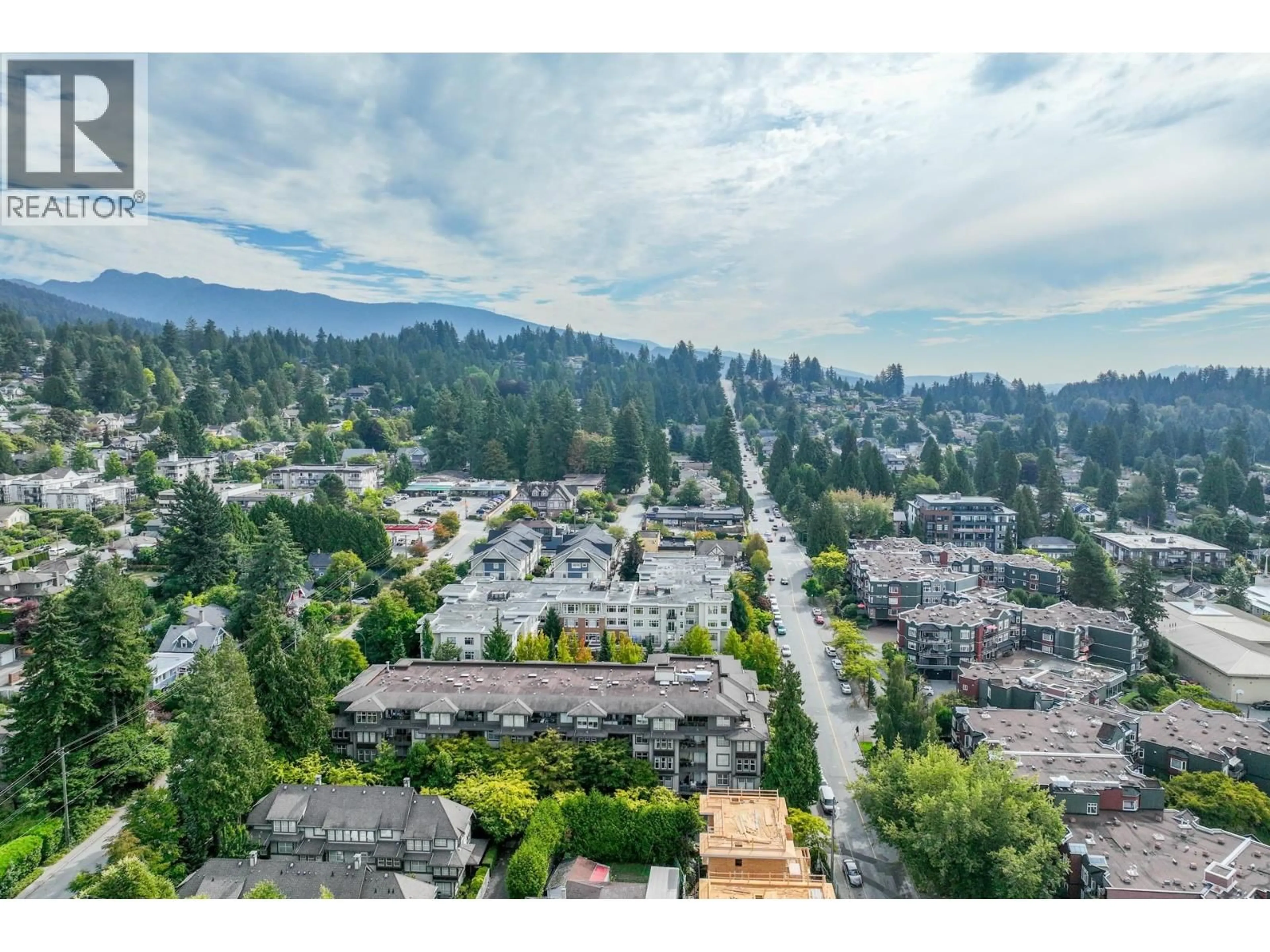 A pic from outside/outdoor area/front of a property/back of a property/a pic from drone, mountain view for 206 - 188 29TH STREET, North Vancouver British Columbia V7N0A2