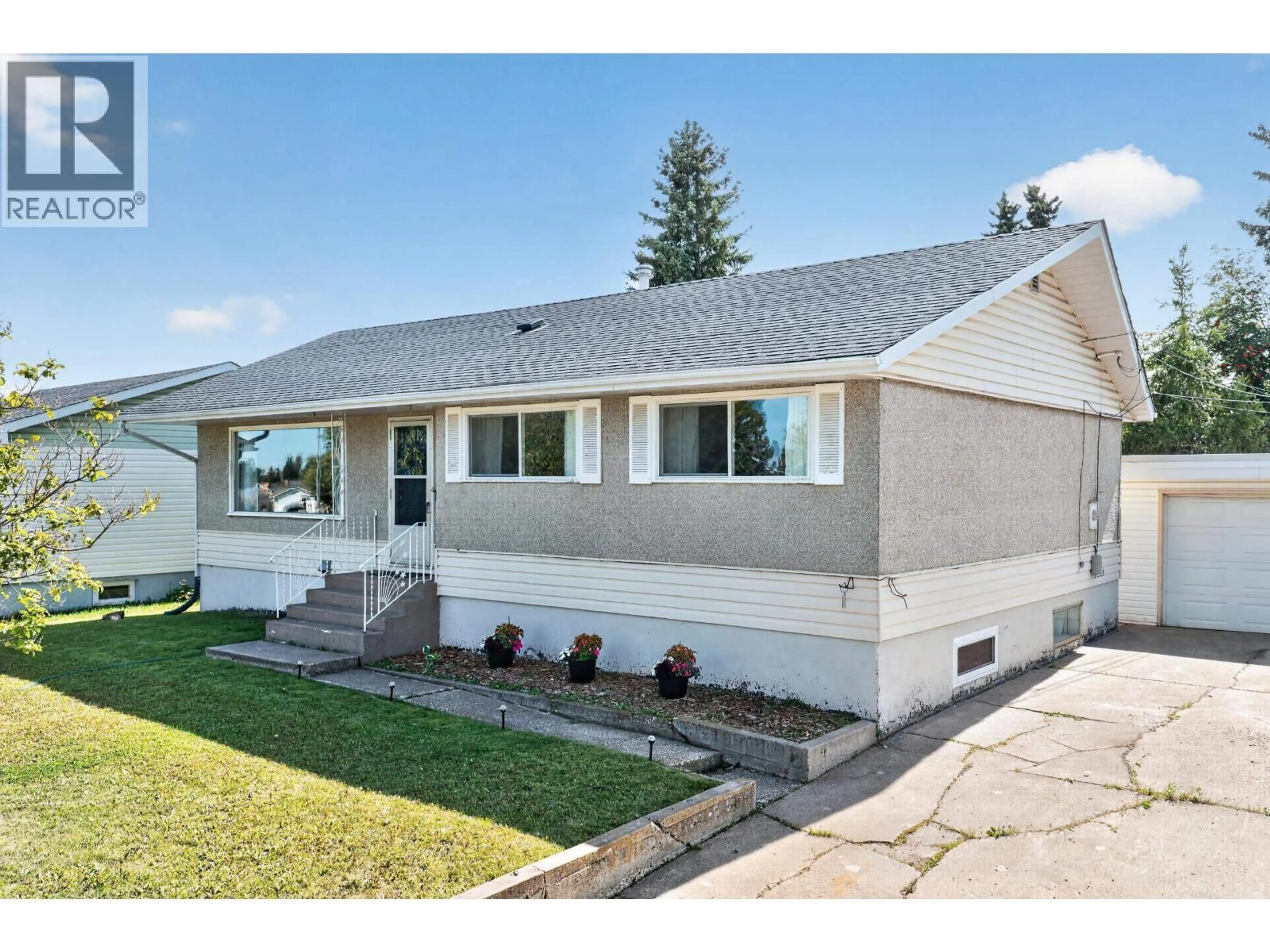 Home with vinyl exterior material, street for 9611 108 AVENUE, Fort St. John British Columbia V1J2P9
