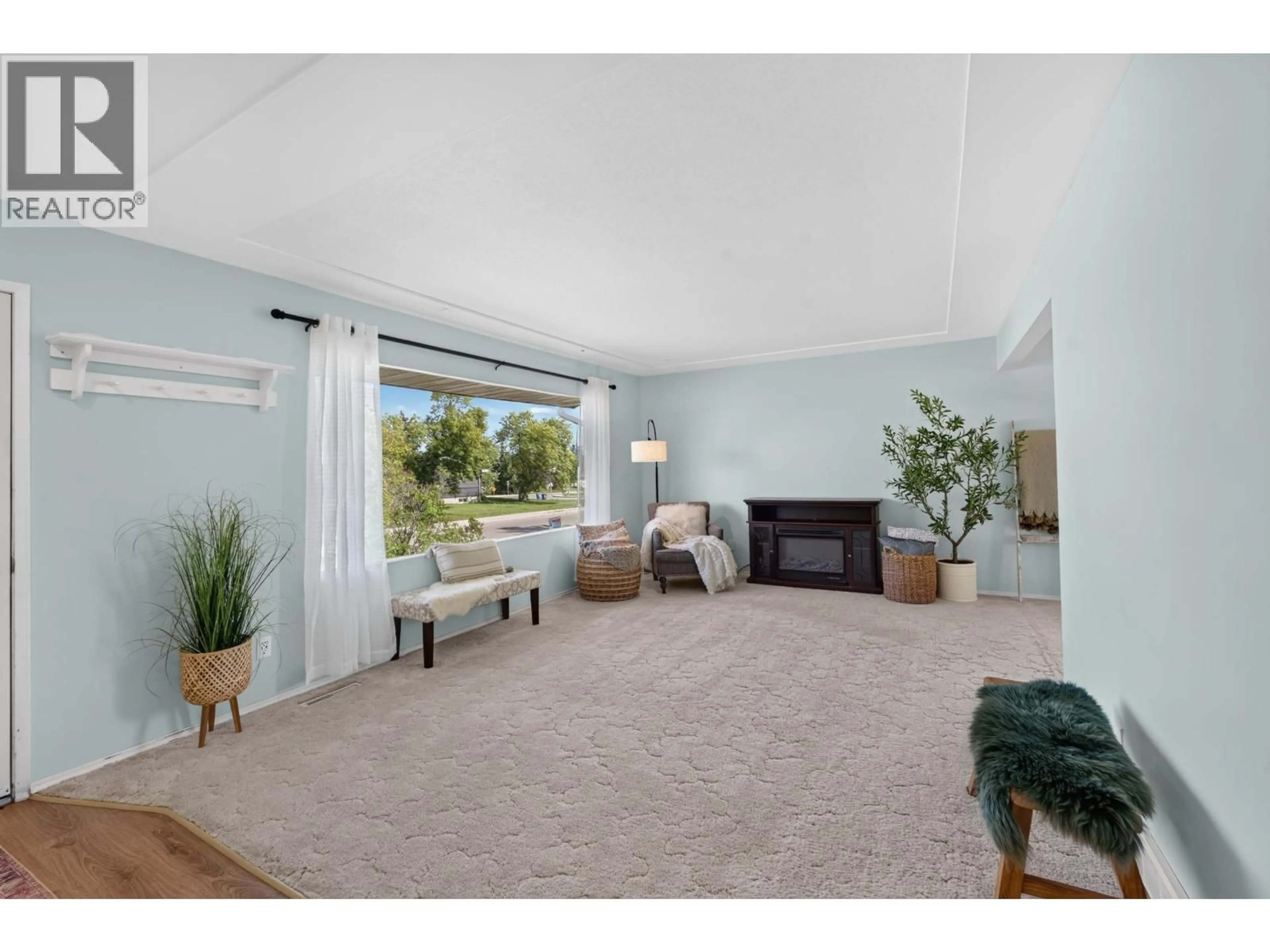 Living room with furniture, unknown for 9611 108 AVENUE, Fort St. John British Columbia V1J2P9