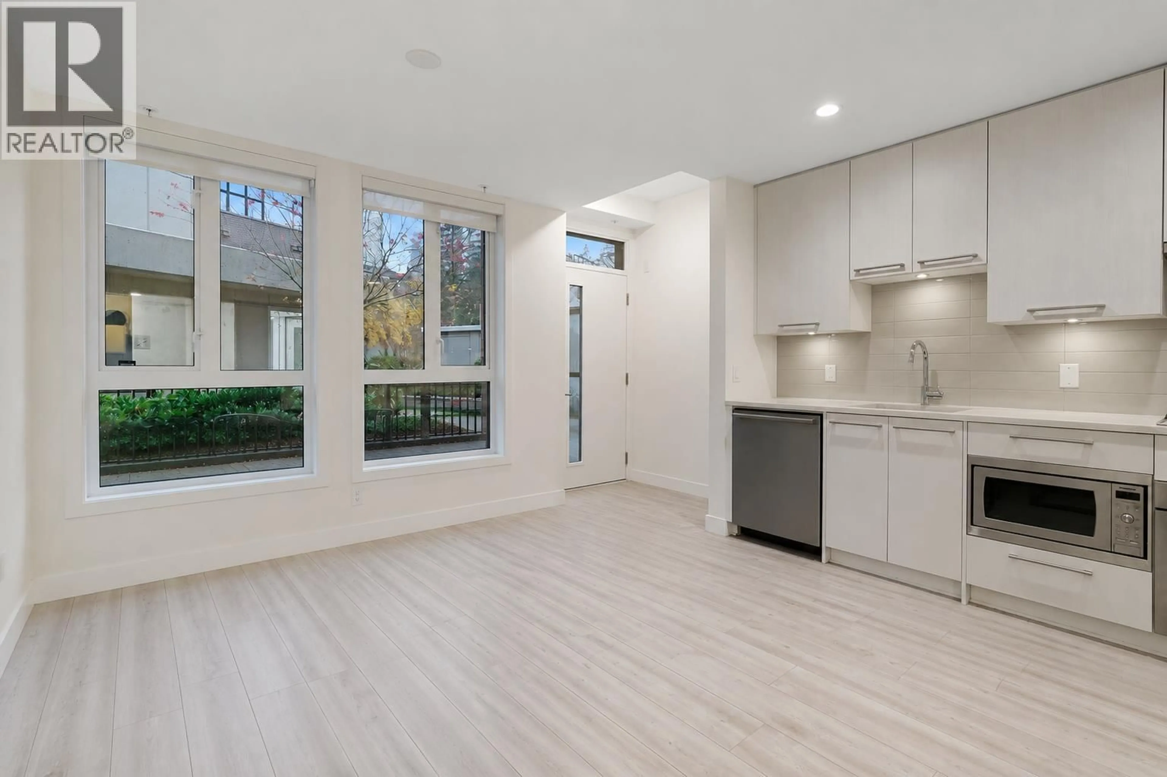 Open concept kitchen, unknown for 124 - 2035 GLENAIRE STREET, North Vancouver British Columbia V7P1Y2