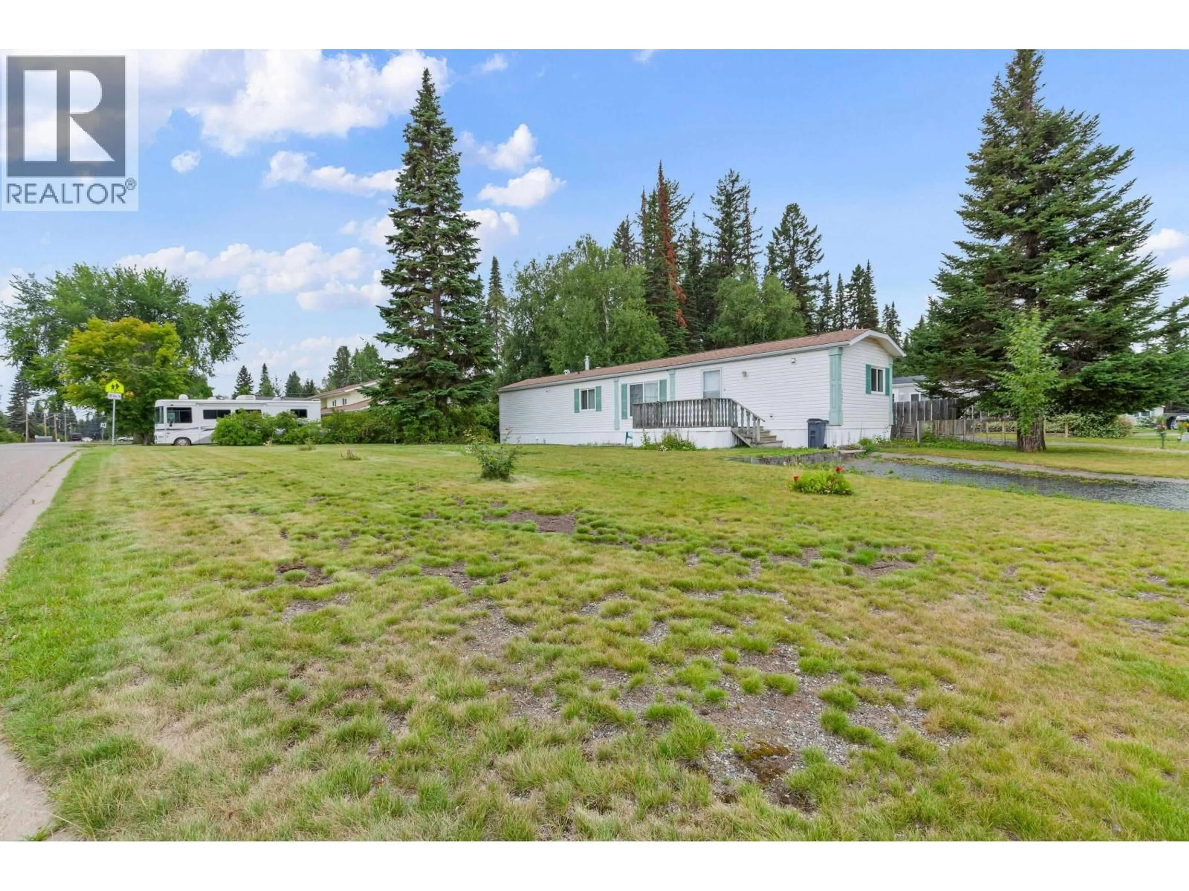 A pic from outside/outdoor area/front of a property/back of a property/a pic from drone, mountain view for 3001 THEE COURT, Prince George British Columbia V2K5B5