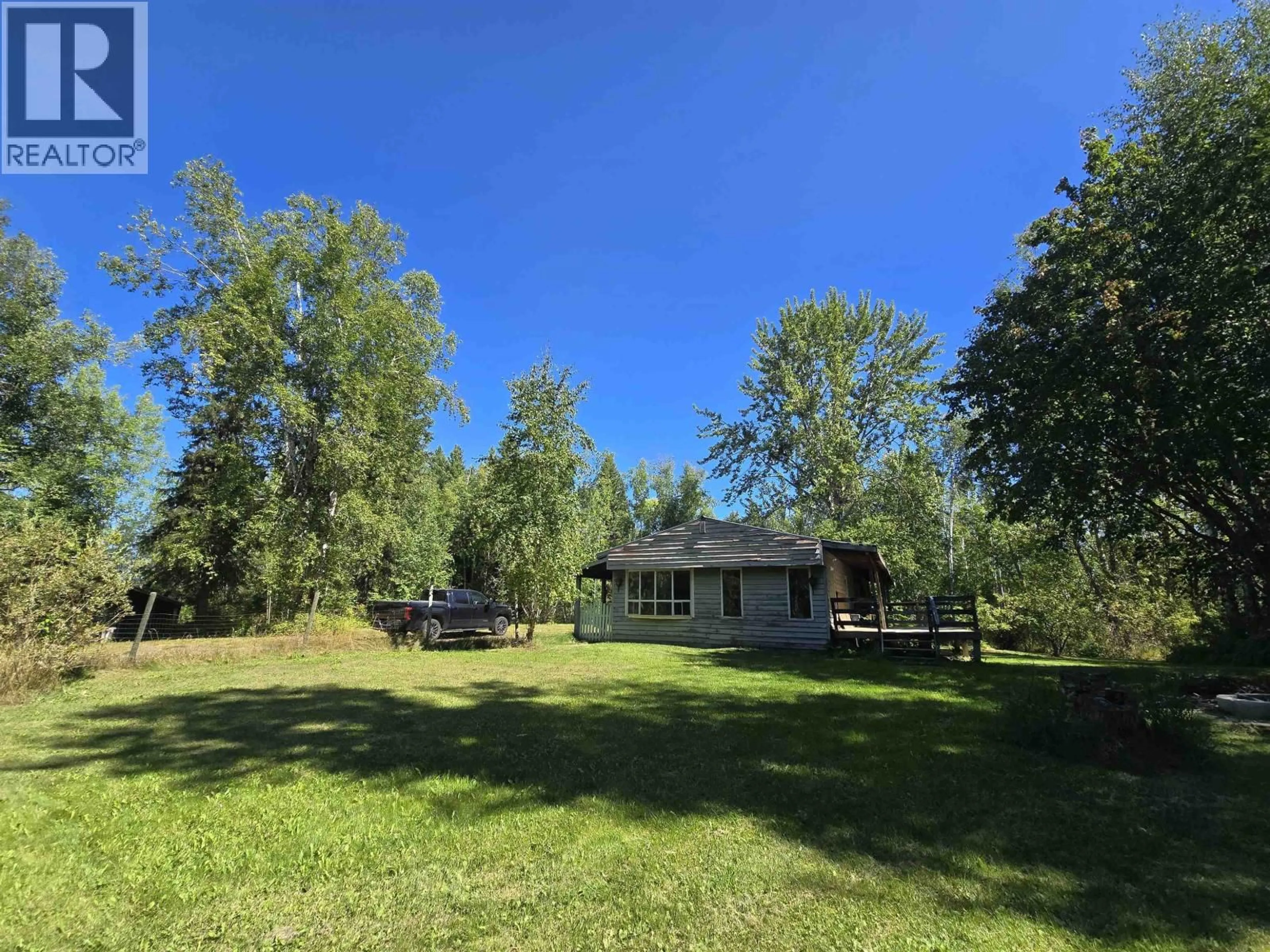 A pic from outside/outdoor area/front of a property/back of a property/a pic from drone, forest/trees view for 930 HESKETH ROAD, Quesnel British Columbia V2J7H6