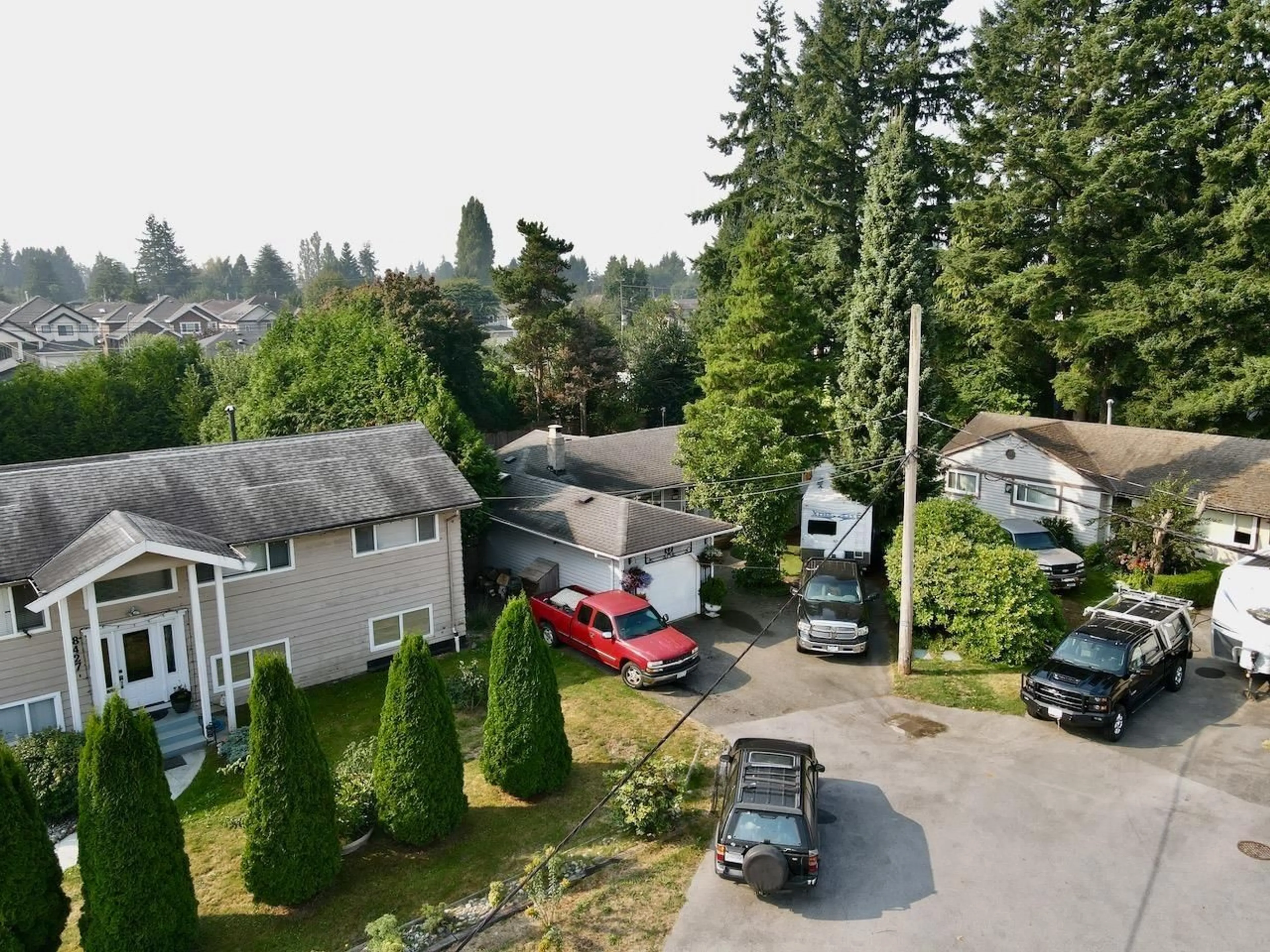 A pic from outside/outdoor area/front of a property/back of a property/a pic from drone, street for 8435 109B STREET, Delta British Columbia V4C4H4
