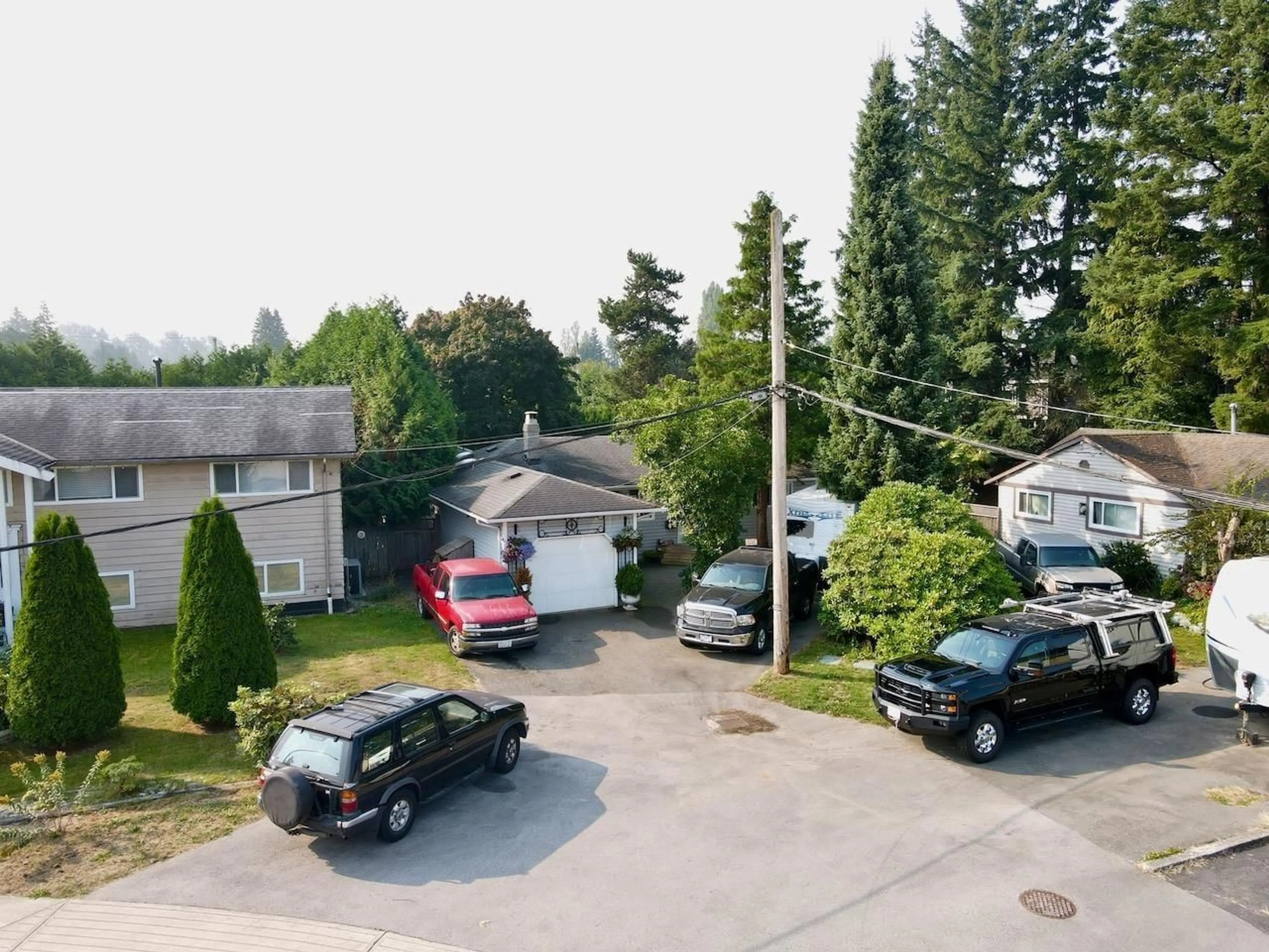 A pic from outside/outdoor area/front of a property/back of a property/a pic from drone, street for 8435 109B STREET, Delta British Columbia V4C4H4