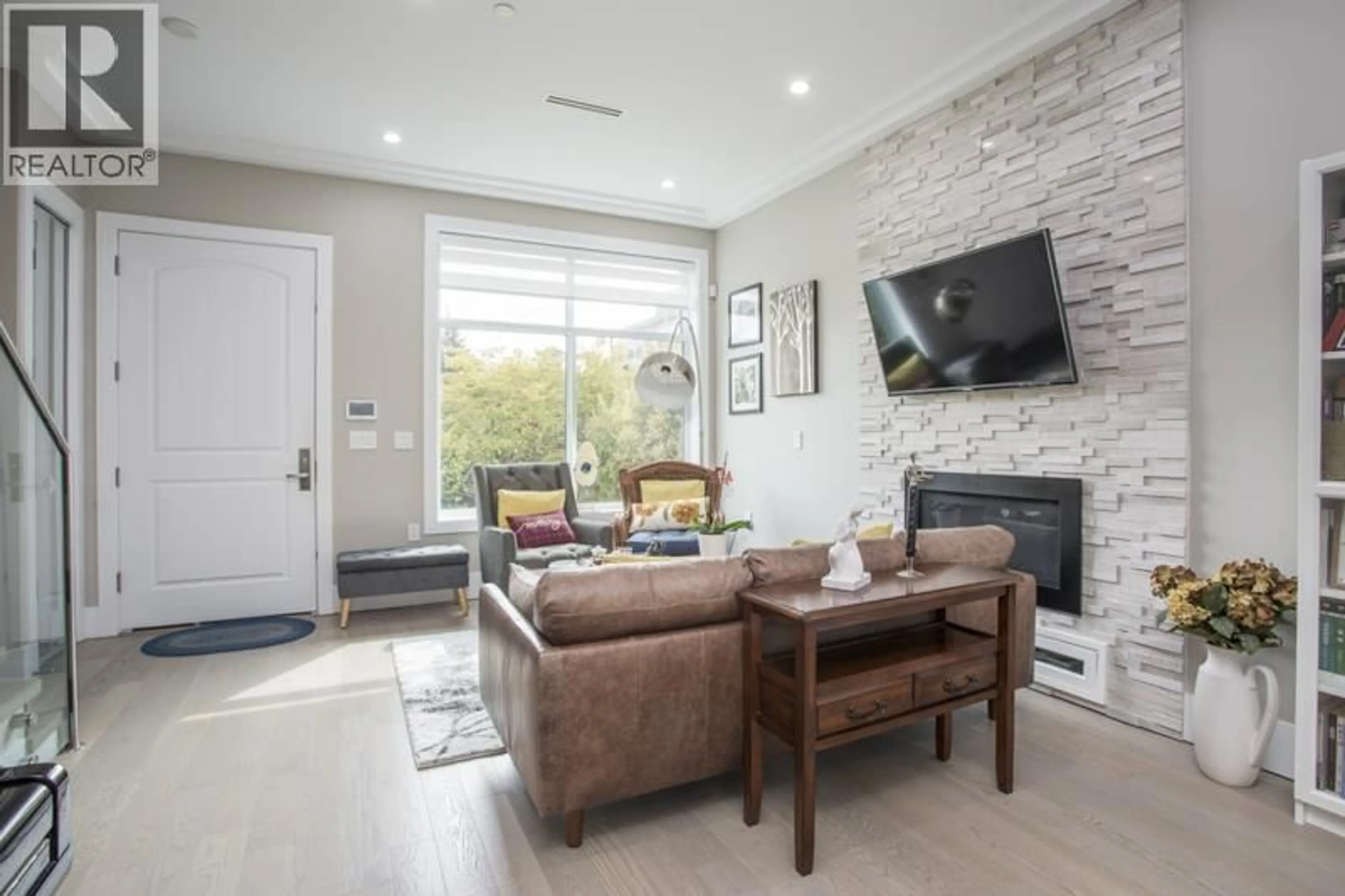 Living room with furniture, ceramic/tile floor for 8559 MONTCALM STREET, Vancouver British Columbia V6P4P6