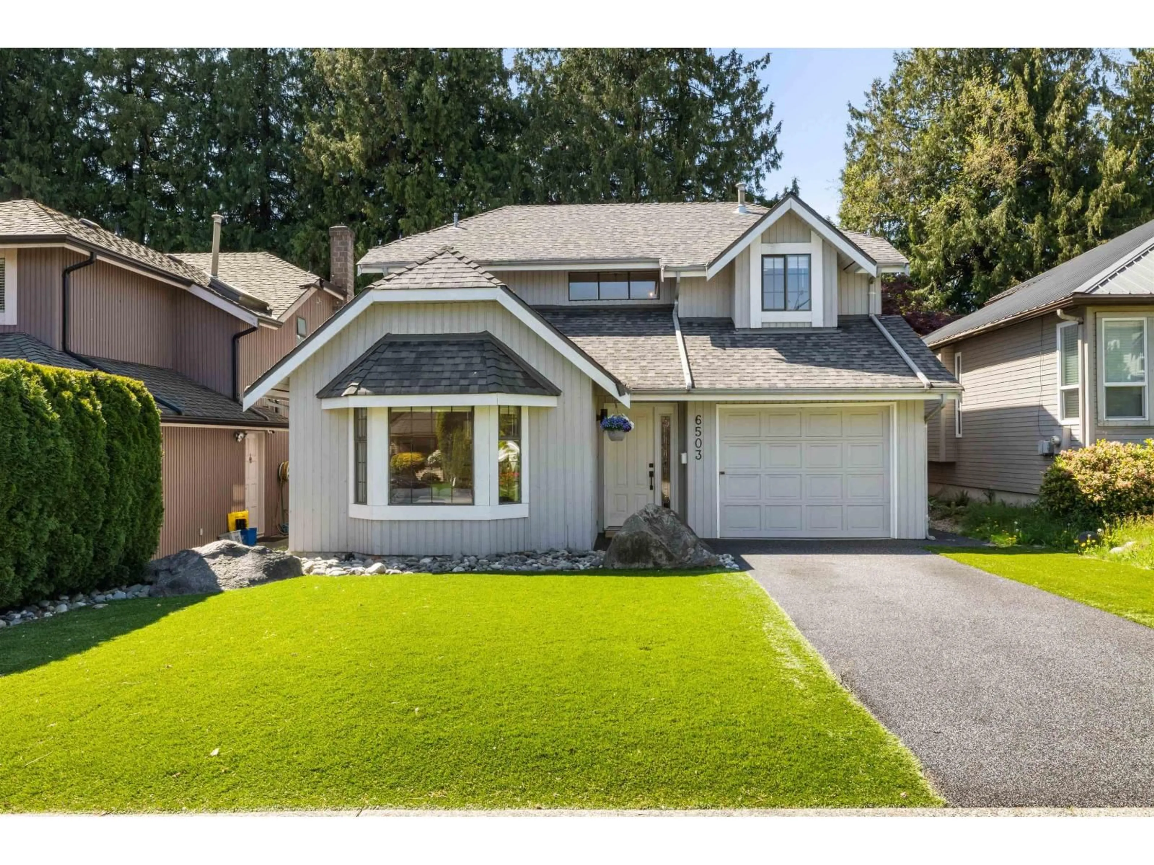 Home with vinyl exterior material, street for 6503 WOODGLEN STREET, Delta British Columbia V4E3G8