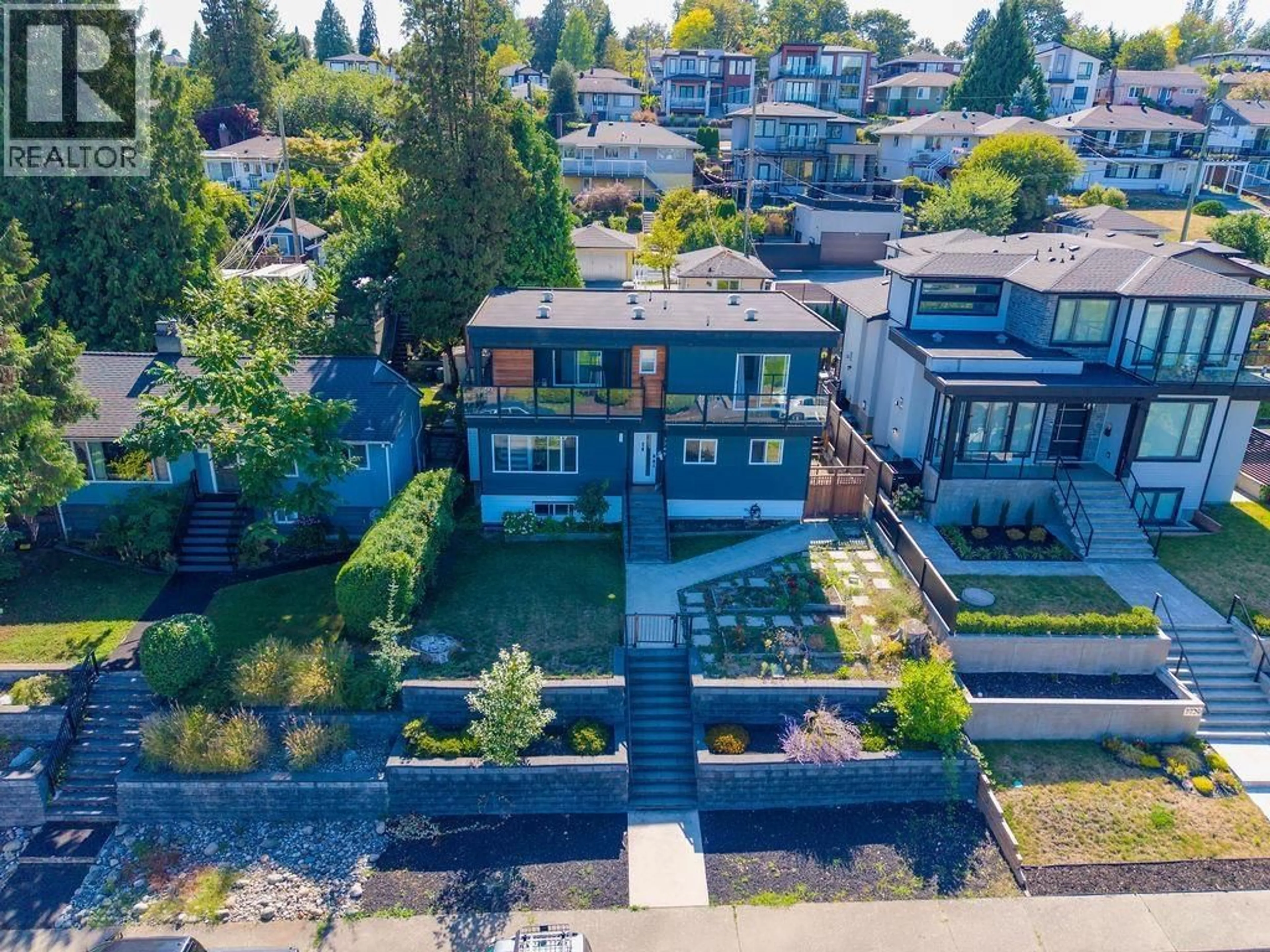 A pic from outside/outdoor area/front of a property/back of a property/a pic from drone, street for 7749 LEE STREET, Burnaby British Columbia V3N4B9