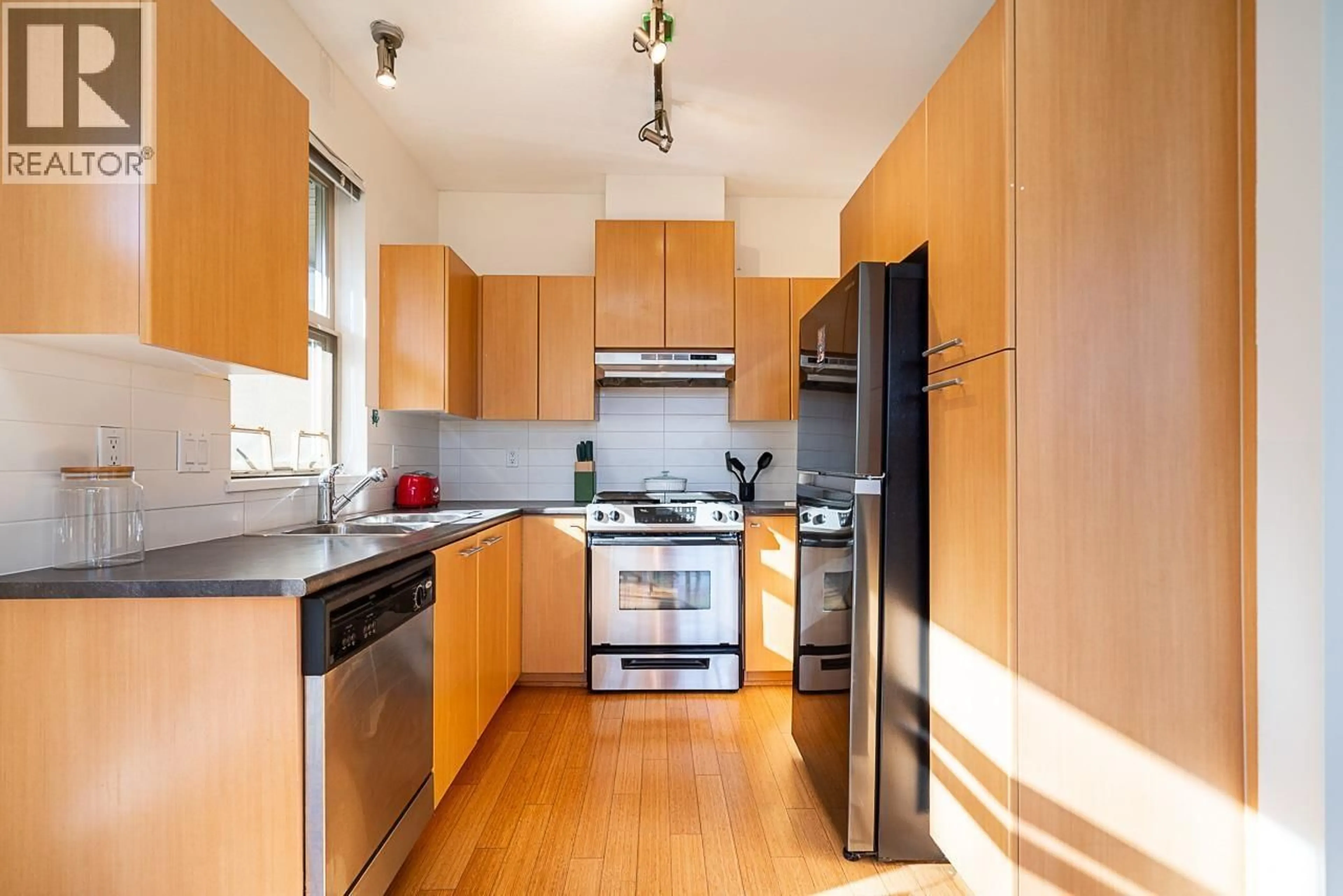 Standard kitchen, wood/laminate floor for 516 - 9319 UNIVERSITY CRESCENT, Burnaby British Columbia V5A4Y5