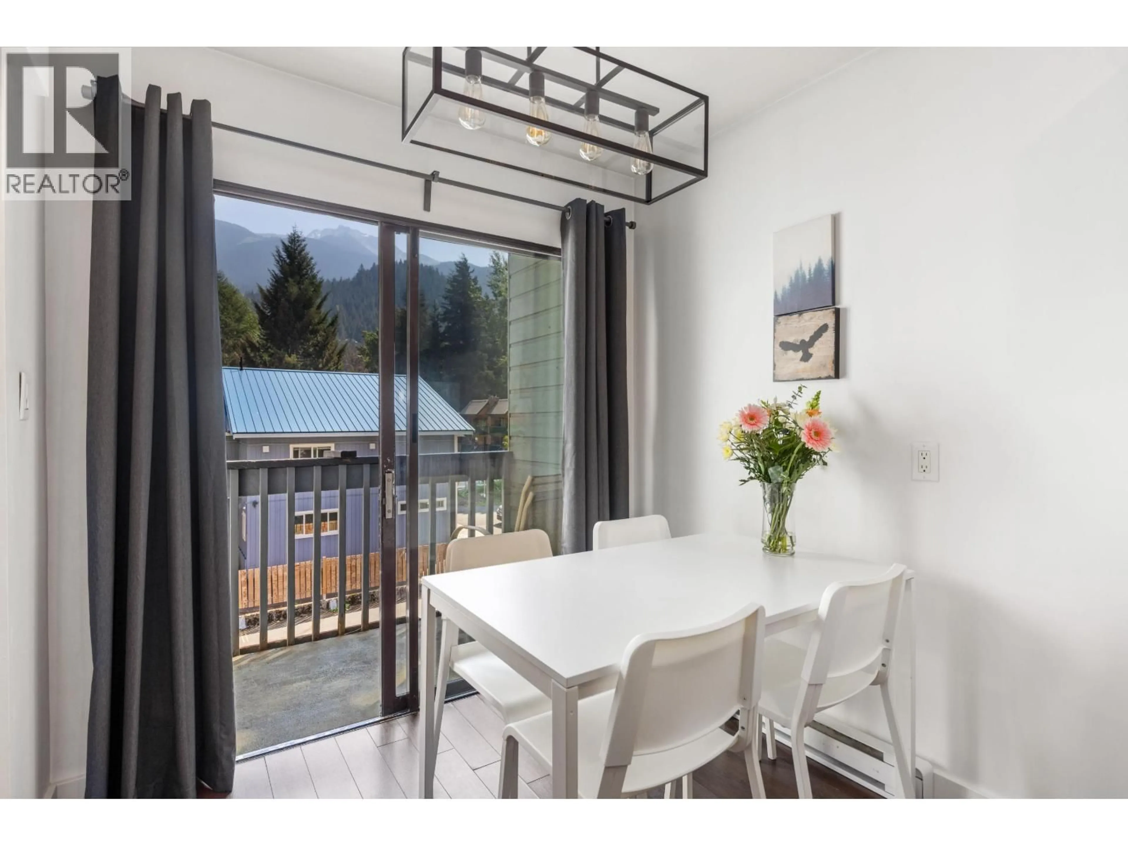 Dining room, wood/laminate floor for 301 - 2129 LAKE PLACID ROAD, Whistler British Columbia V8E0N4