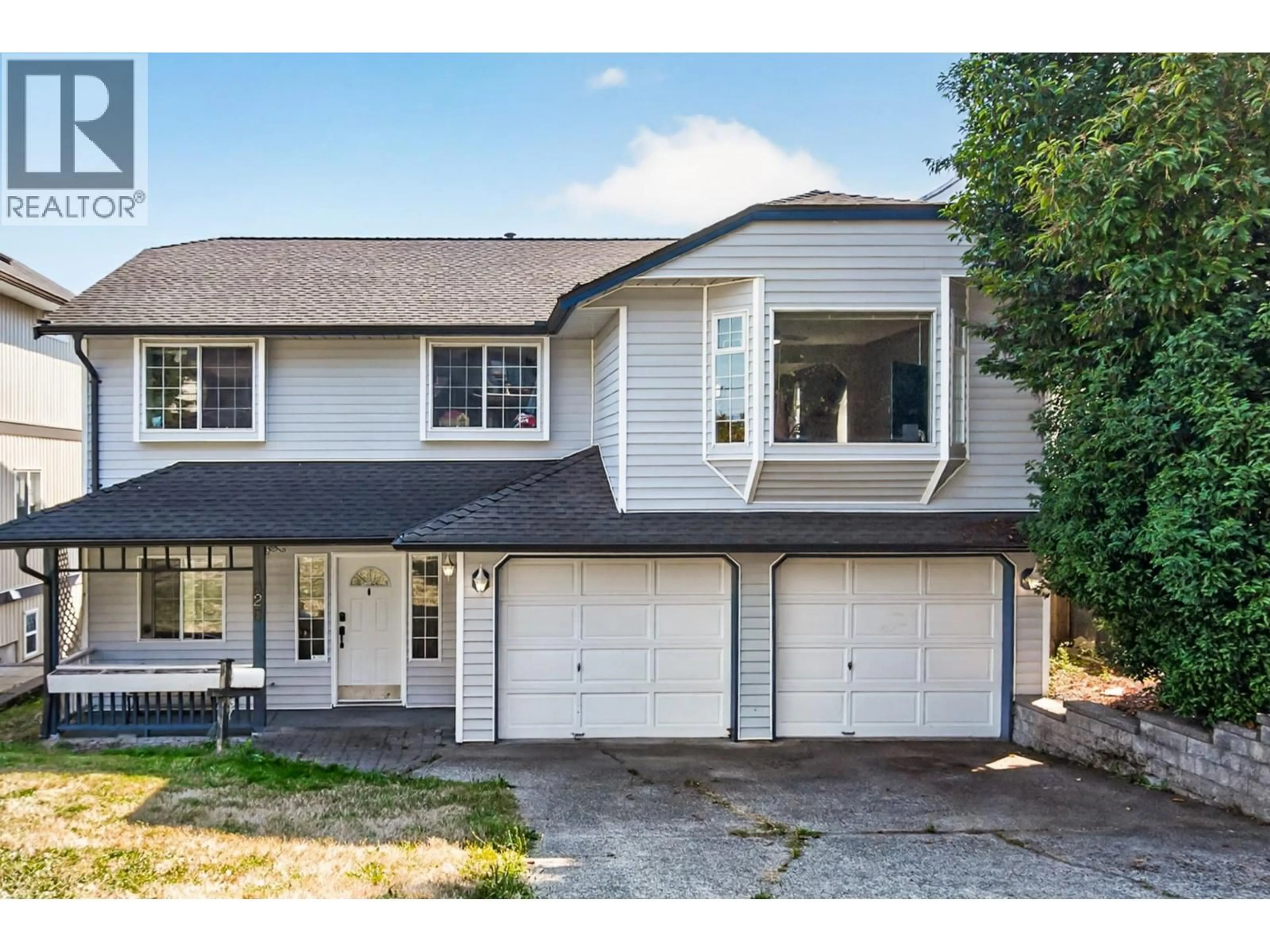 Home with vinyl exterior material, street for 828 HUBER DRIVE, Port Coquitlam British Columbia V3B2S9