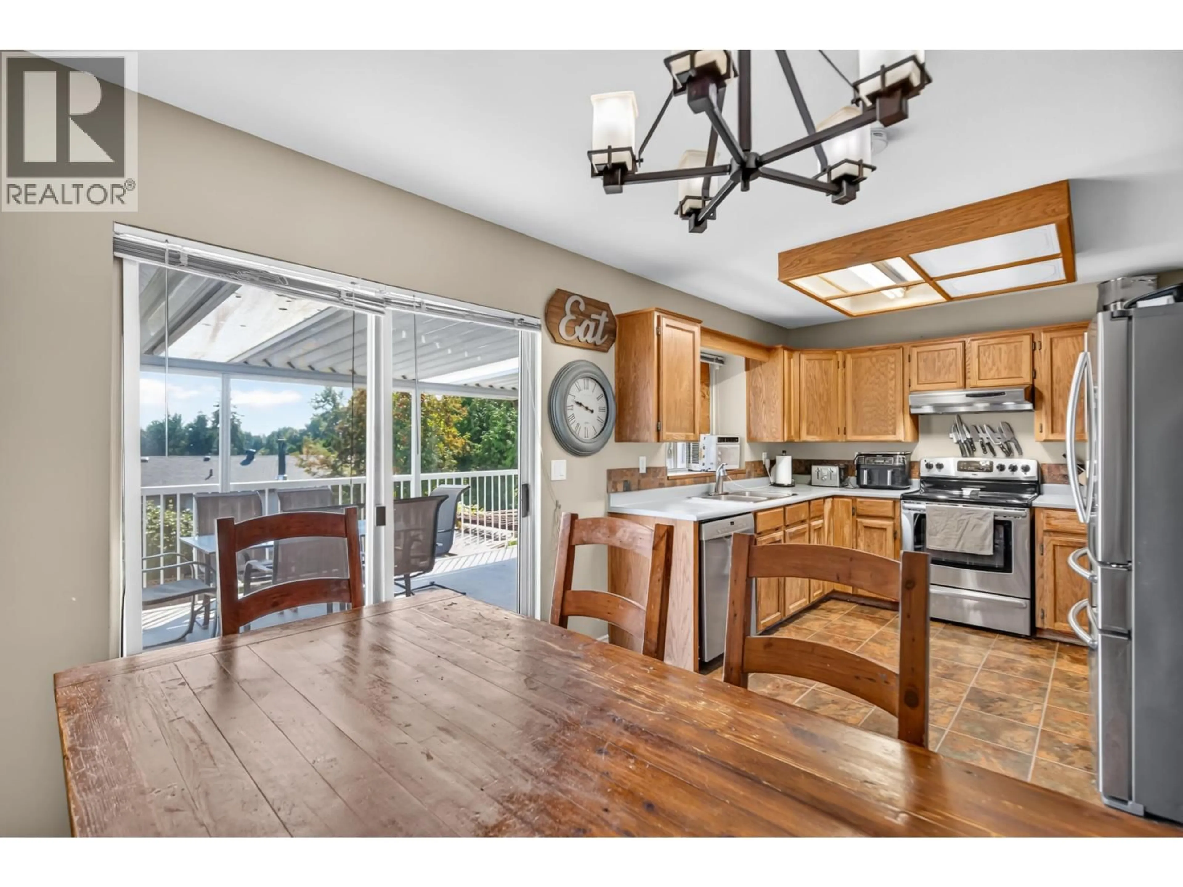 Open concept kitchen, wood/laminate floor for 828 HUBER DRIVE, Port Coquitlam British Columbia V3B2S9