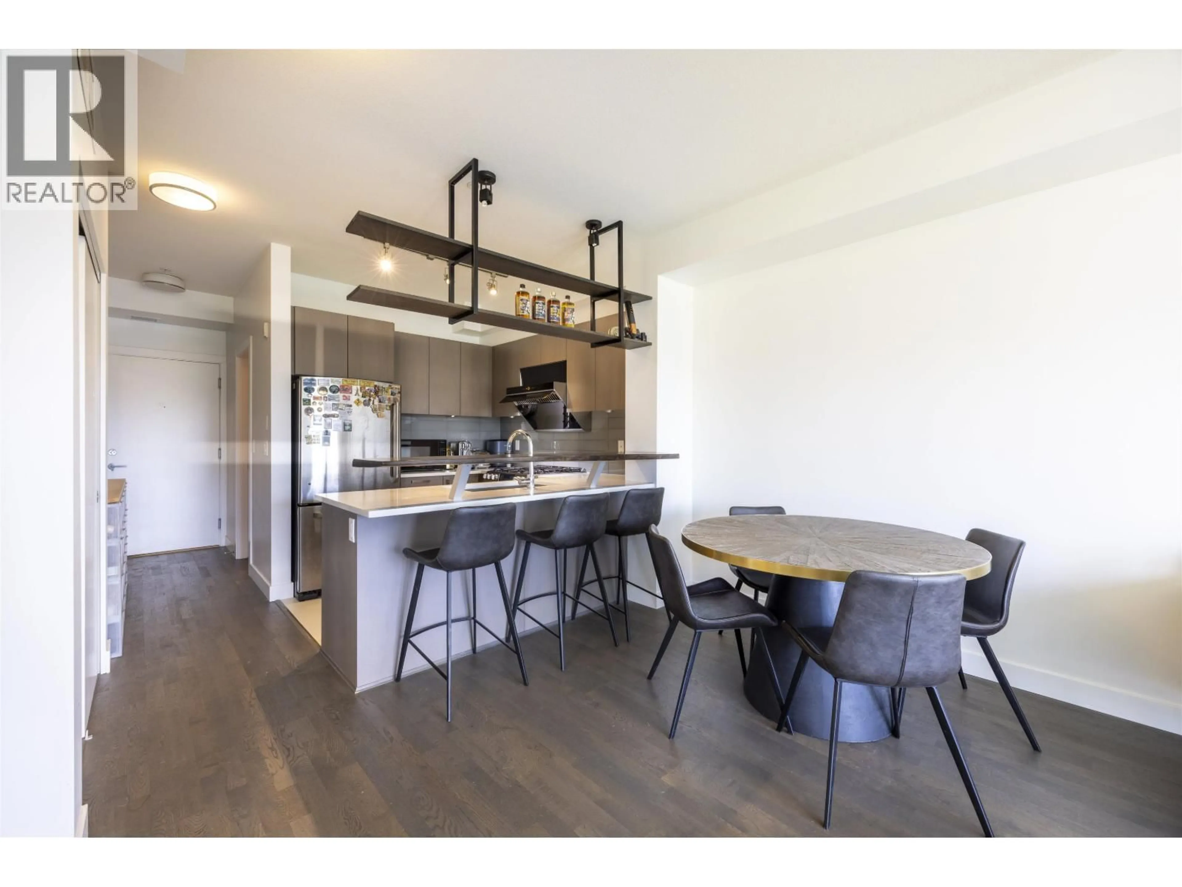 Open concept kitchen, wood/laminate floor for 309 - 10033 RIVER DRIVE, Richmond British Columbia V6X0L2