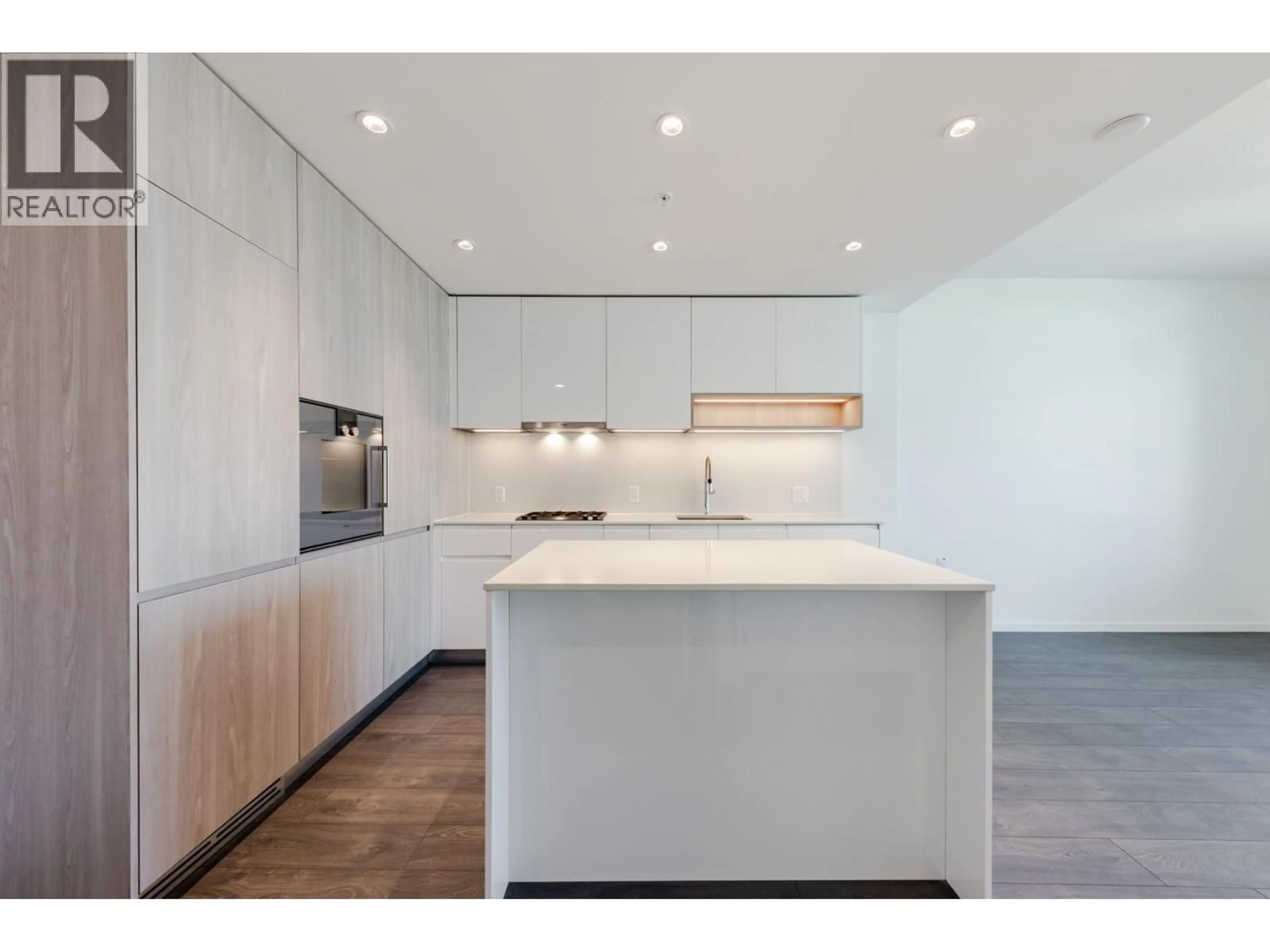 Open concept kitchen, wood/laminate floor for 728 - 6300 MINORU BOULEVARD, Richmond British Columbia V6Y0N1