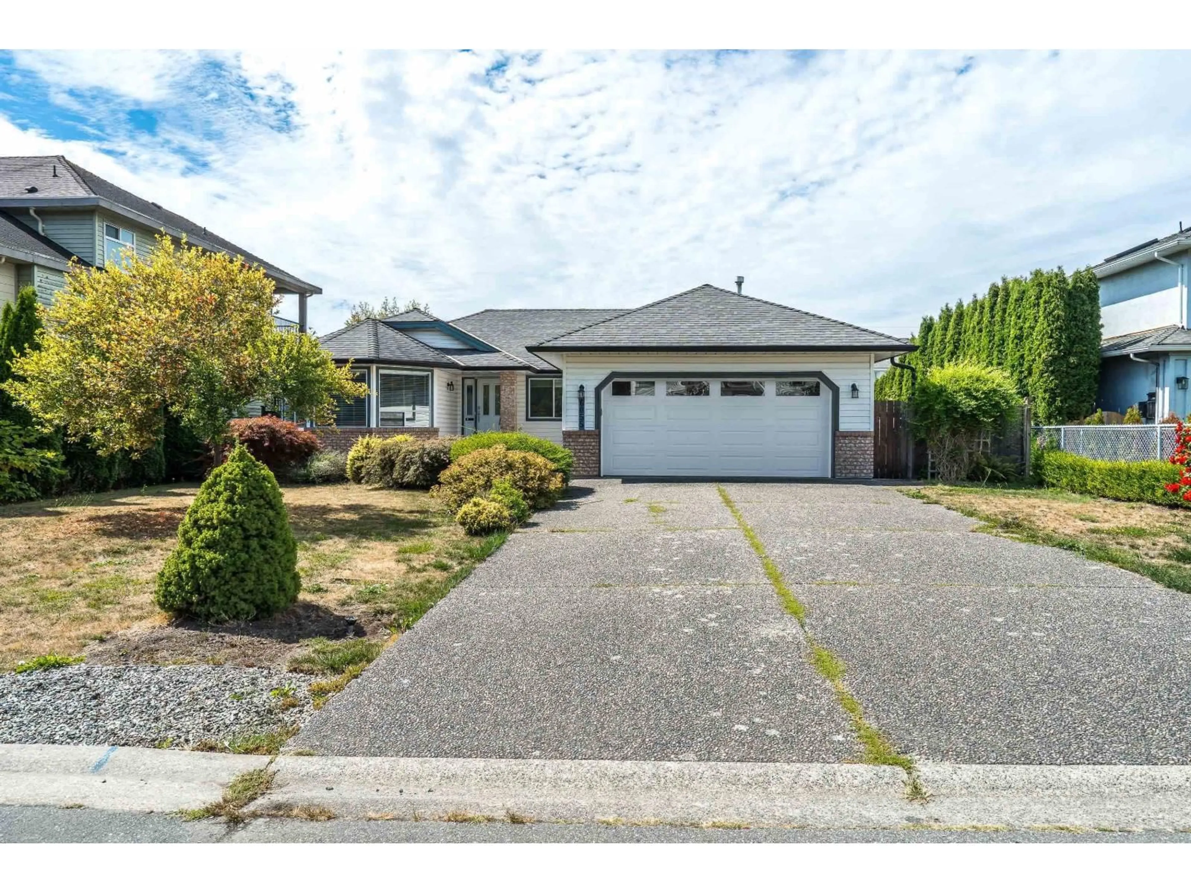 Home with vinyl exterior material, street for 6055 170A STREET, Surrey British Columbia V3S8H1