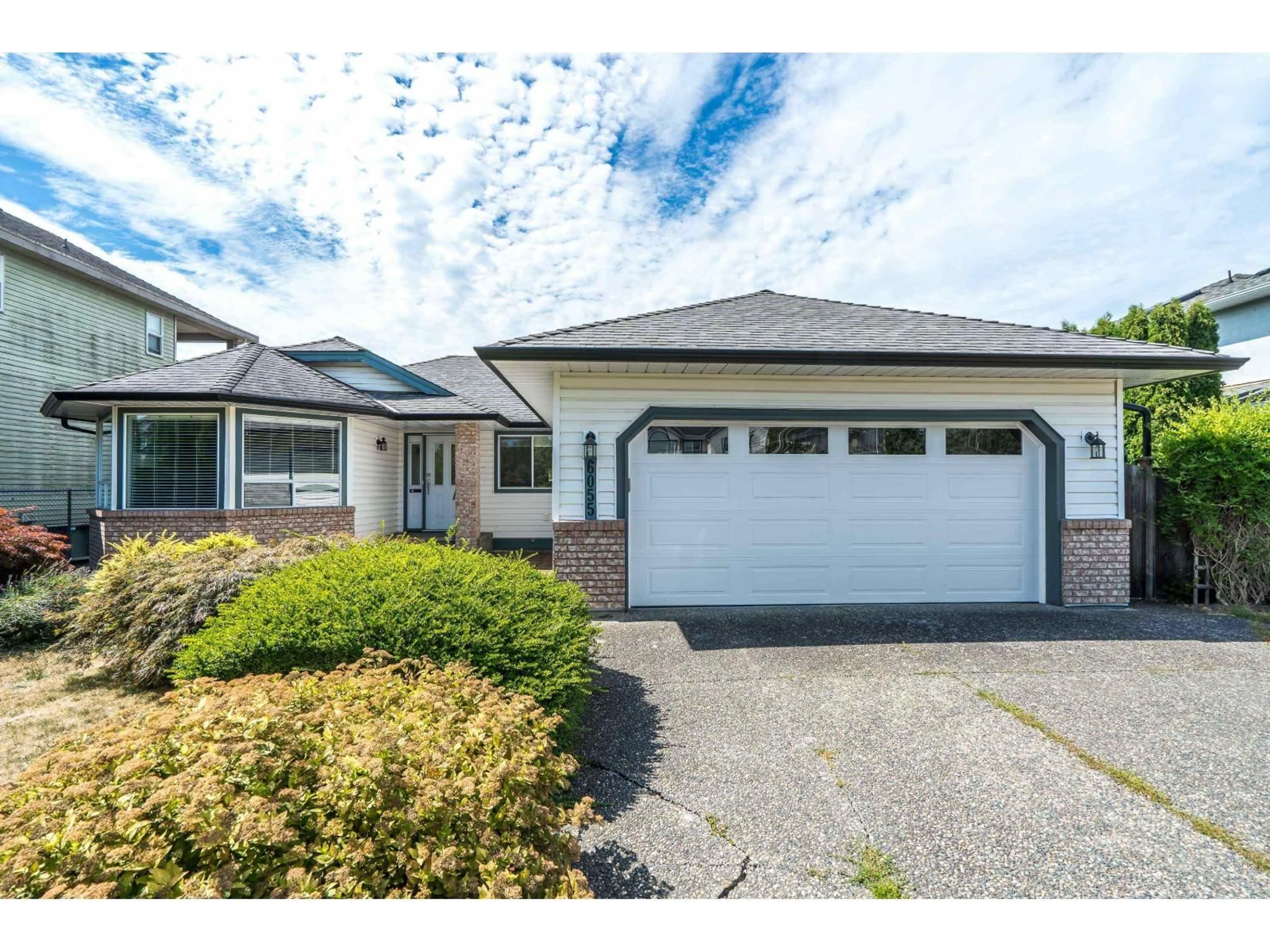 Home with vinyl exterior material, street for 6055 170A STREET, Surrey British Columbia V3S8H1
