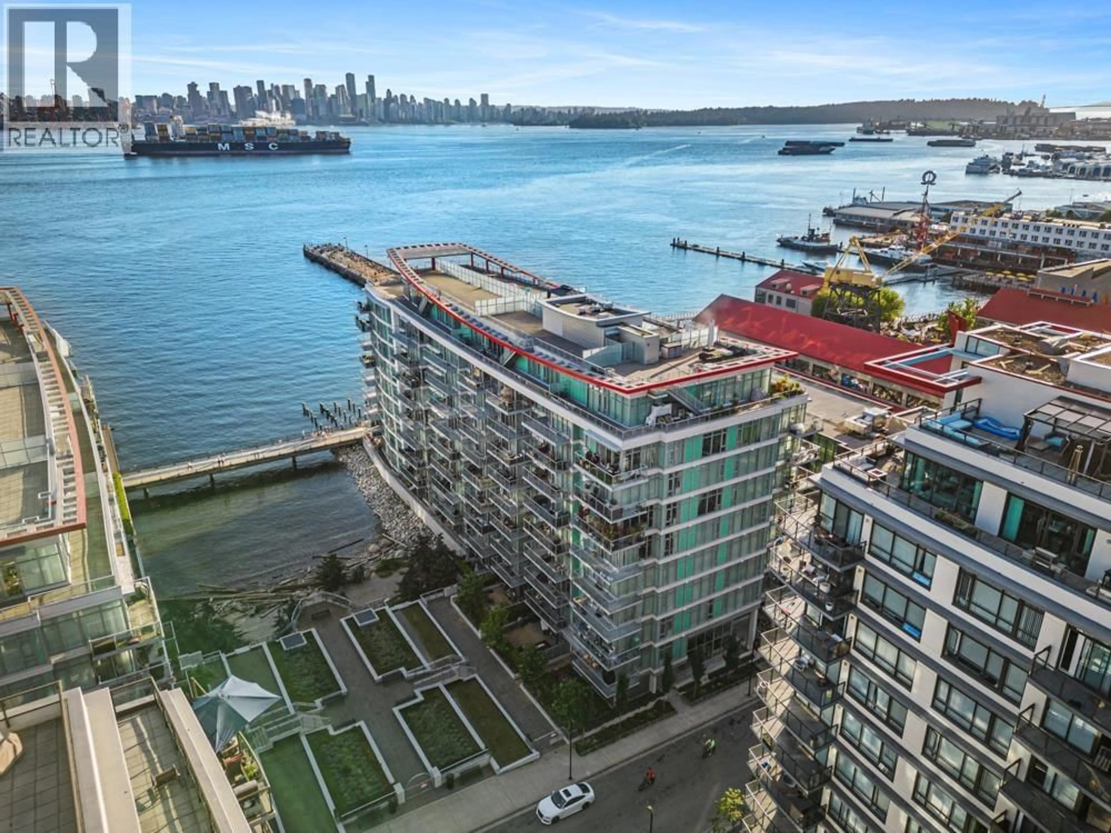 A pic from outside/outdoor area/front of a property/back of a property/a pic from drone, water/lake/river/ocean view for 201 - 175 VICTORY SHIP WAY, North Vancouver British Columbia V7L0G1