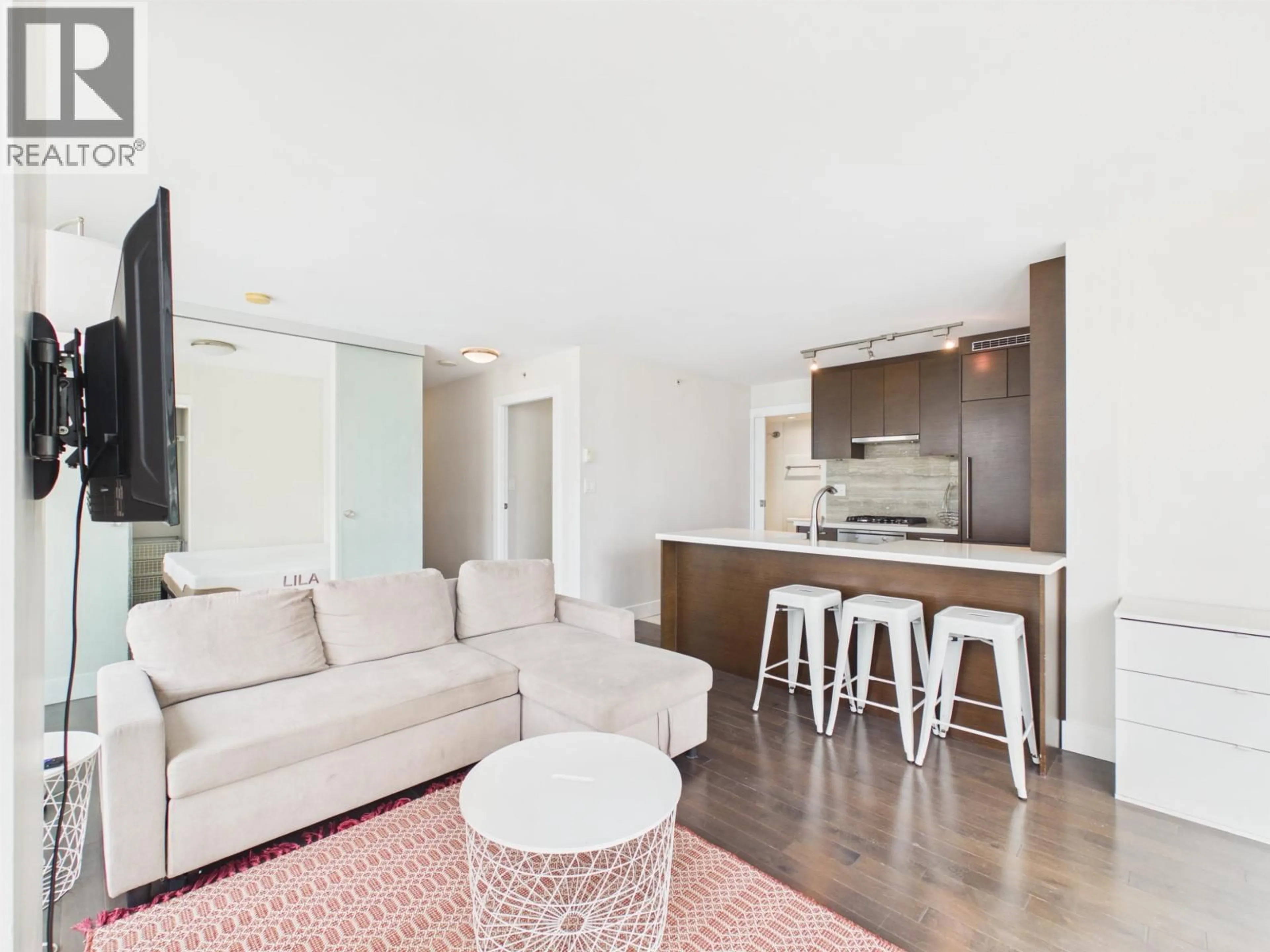 Living room with furniture, wood/laminate floor for 1101 - 535 SMITHE STREET, Vancouver British Columbia V6B0H2