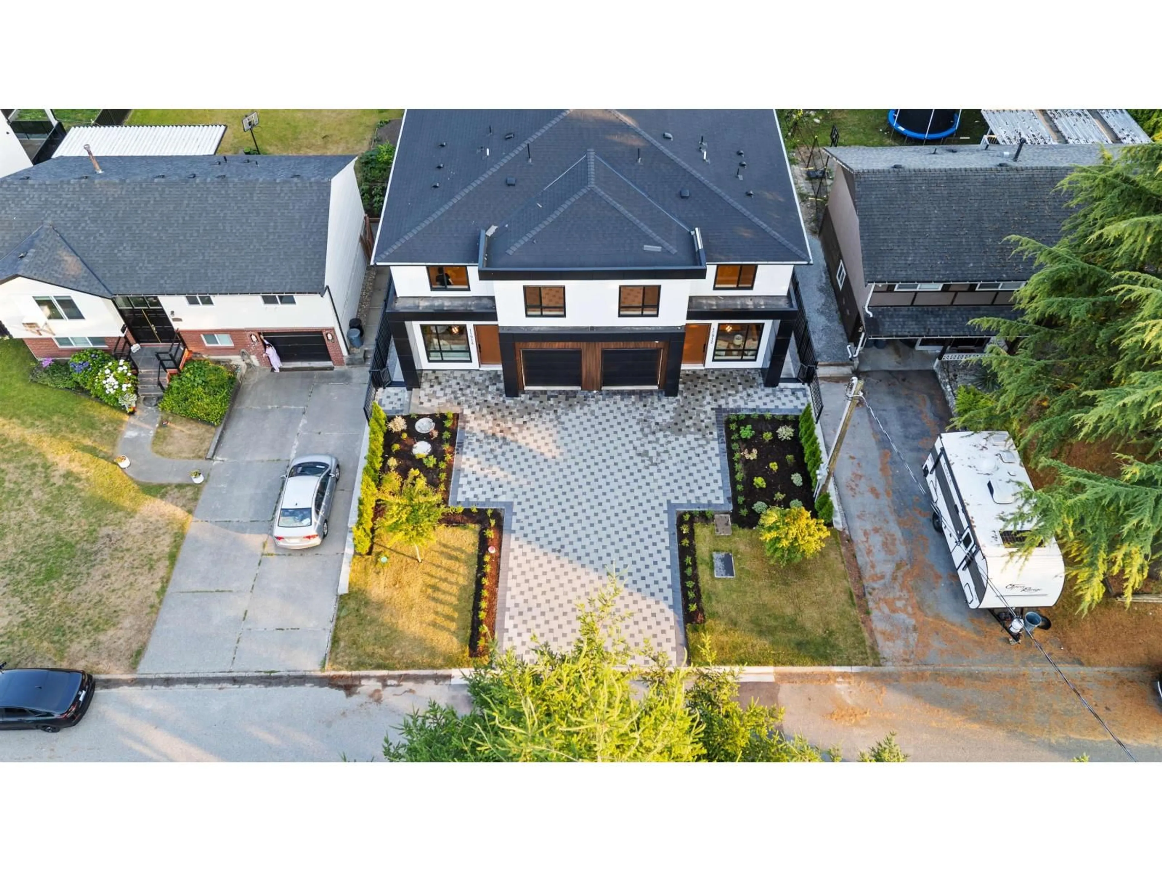 A pic from outside/outdoor area/front of a property/back of a property/a pic from drone, street for 11914 78B AVENUE, Delta British Columbia V4C1S1