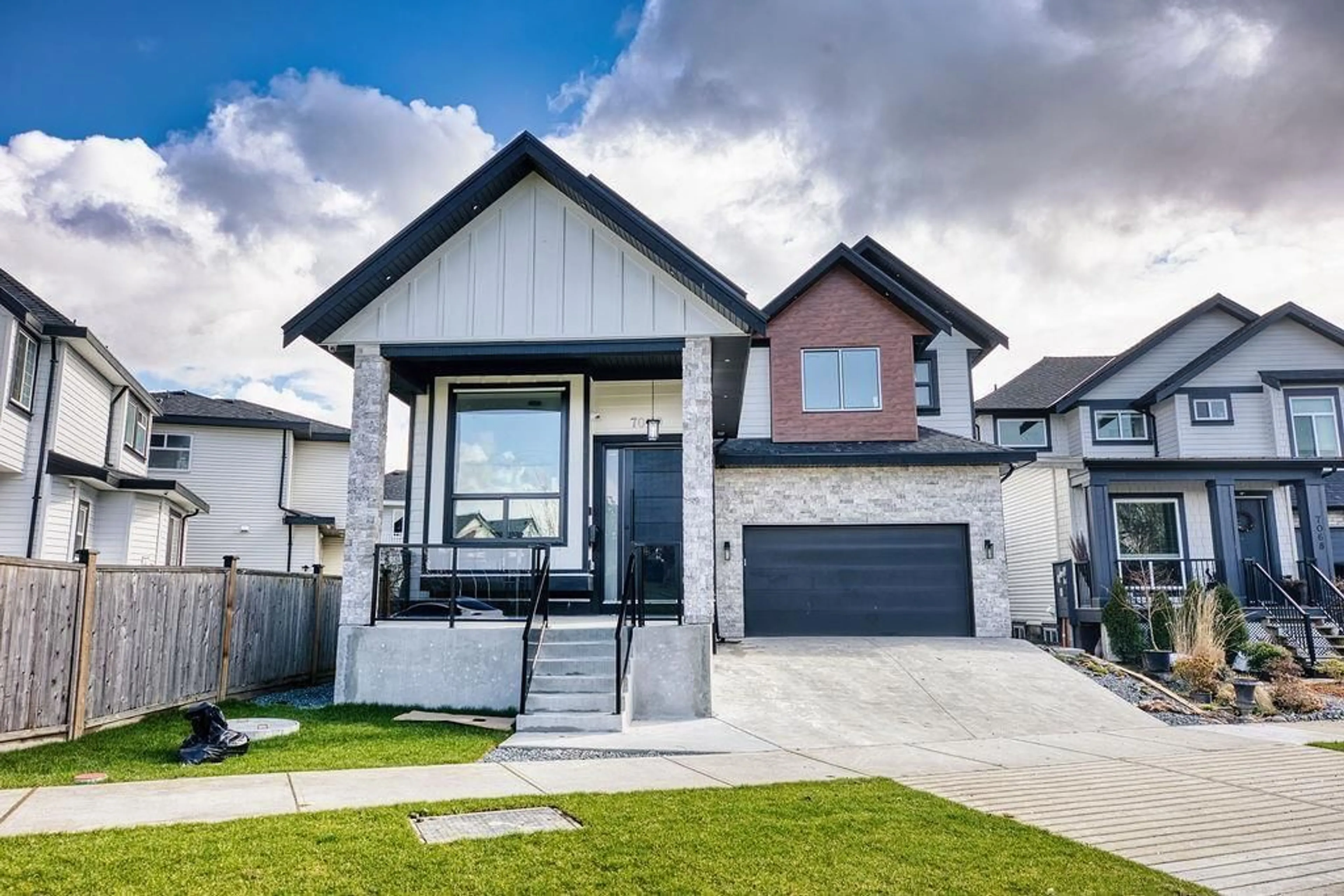 Home with vinyl exterior material, street for 7080 192A STREET, Surrey British Columbia V4N6V1