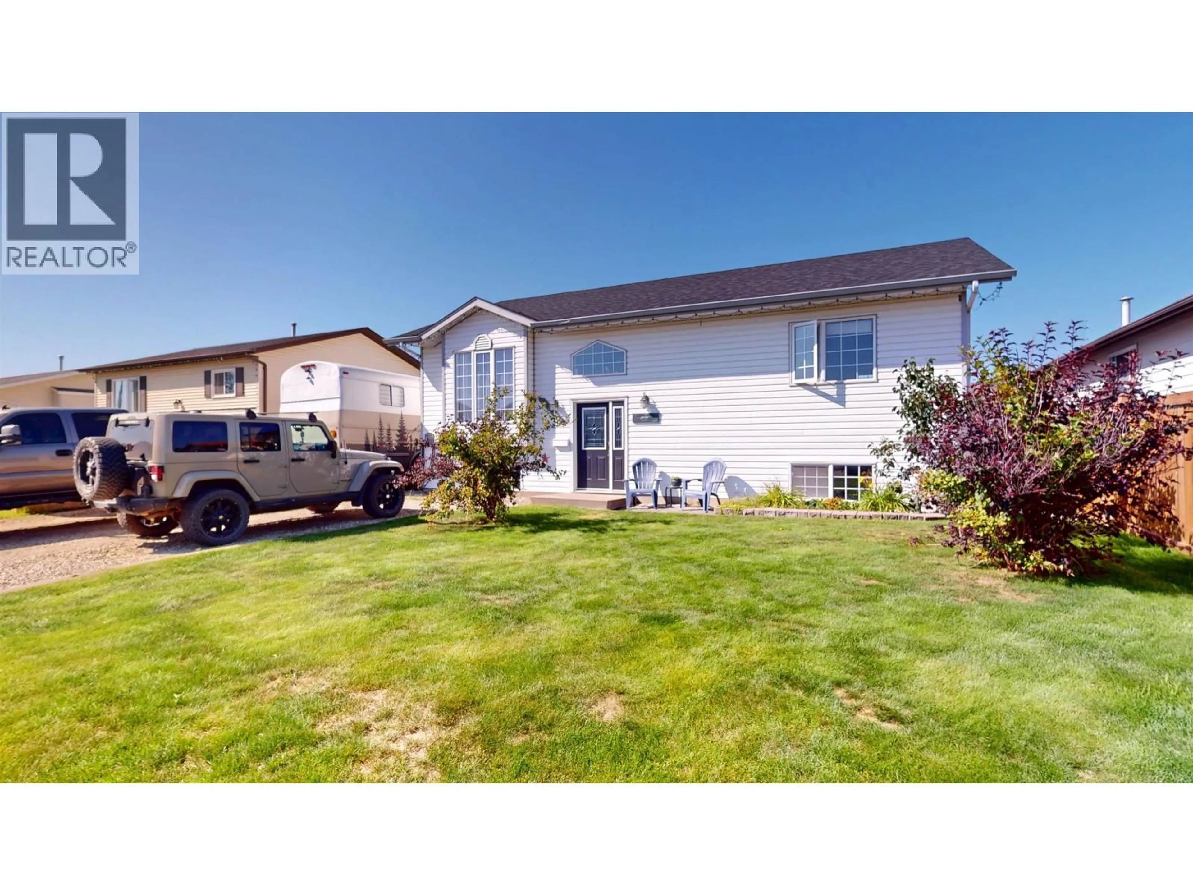 Home with vinyl exterior material, street for 10612 88A STREET, Fort St. John British Columbia V1J5X9