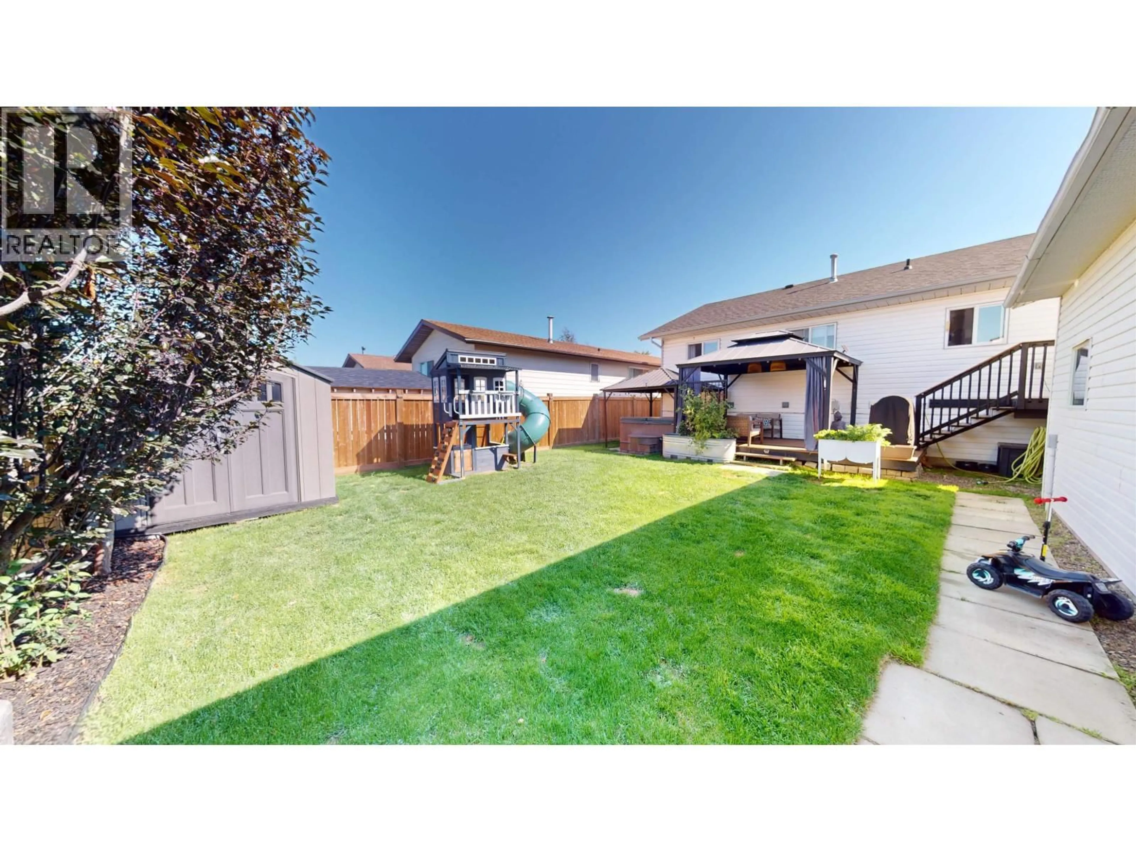 A pic from outside/outdoor area/front of a property/back of a property/a pic from drone, street for 10612 88A STREET, Fort St. John British Columbia V1J5X9