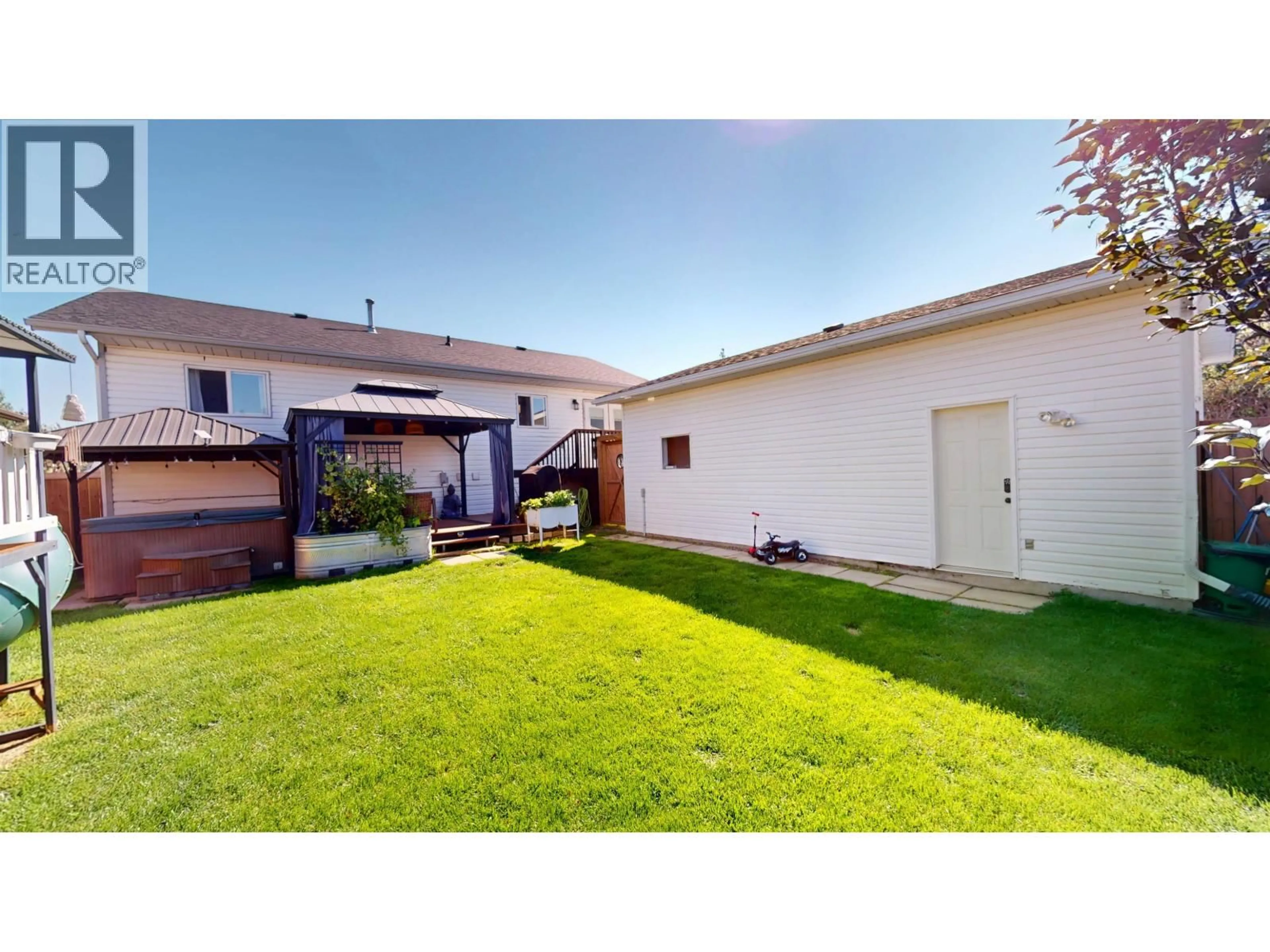 A pic from outside/outdoor area/front of a property/back of a property/a pic from drone, street for 10612 88A STREET, Fort St. John British Columbia V1J5X9