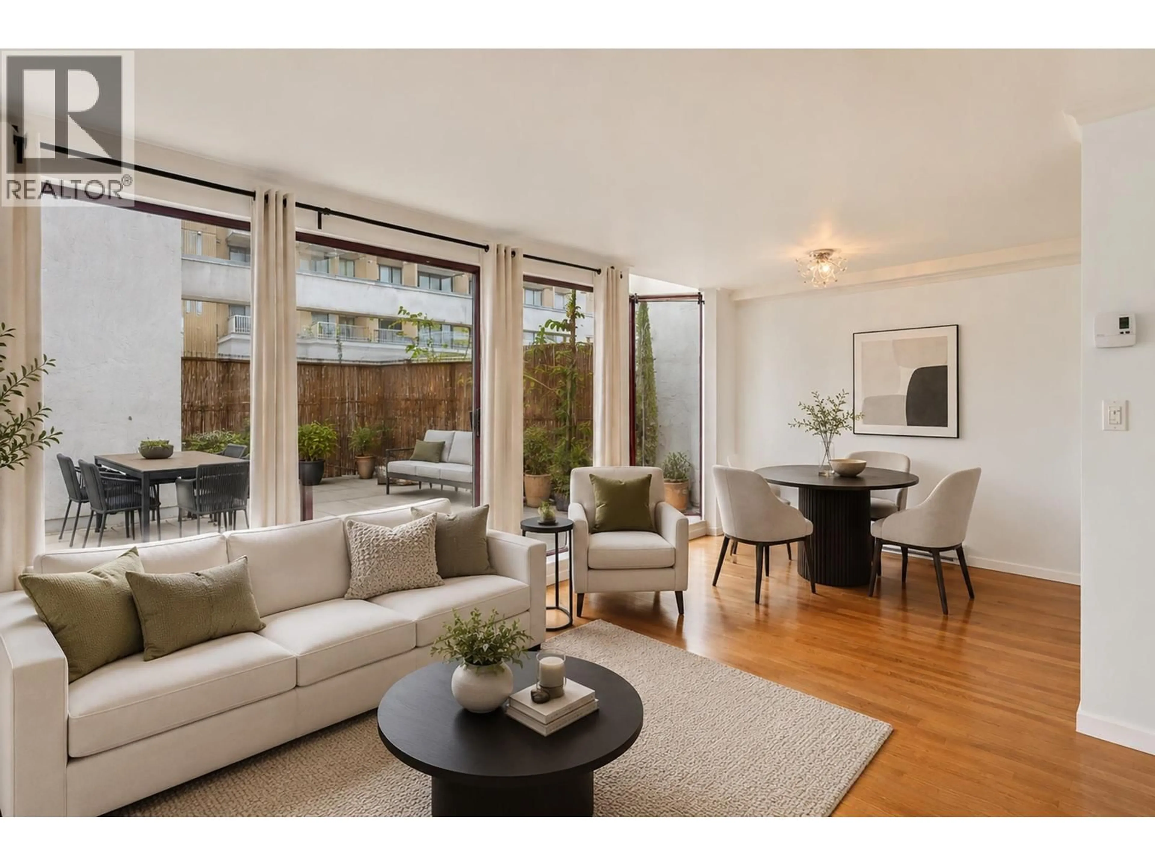 Living room with furniture, wood/laminate floor for 602 - 1042 NELSON STREET, Vancouver British Columbia V6E1H8