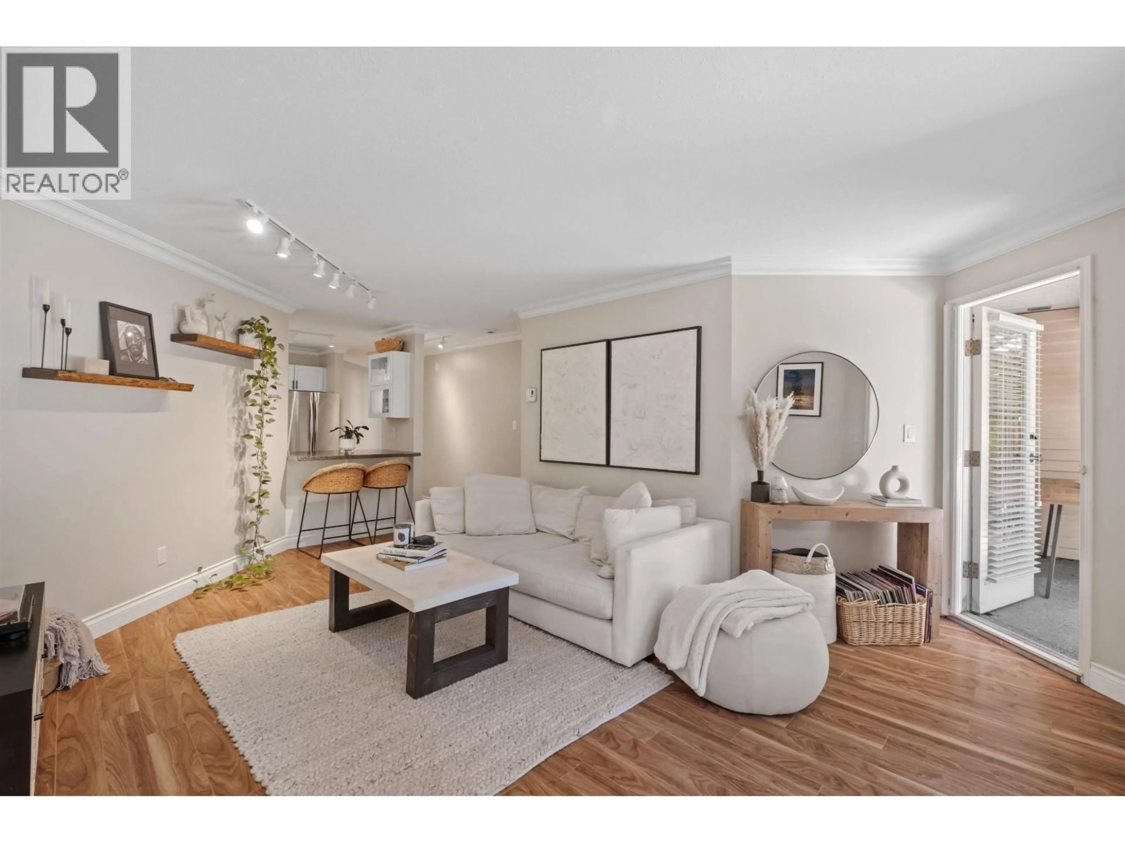 Living room with furniture, unknown for 102 - 123 6TH STREET, North Vancouver British Columbia V7L1N9