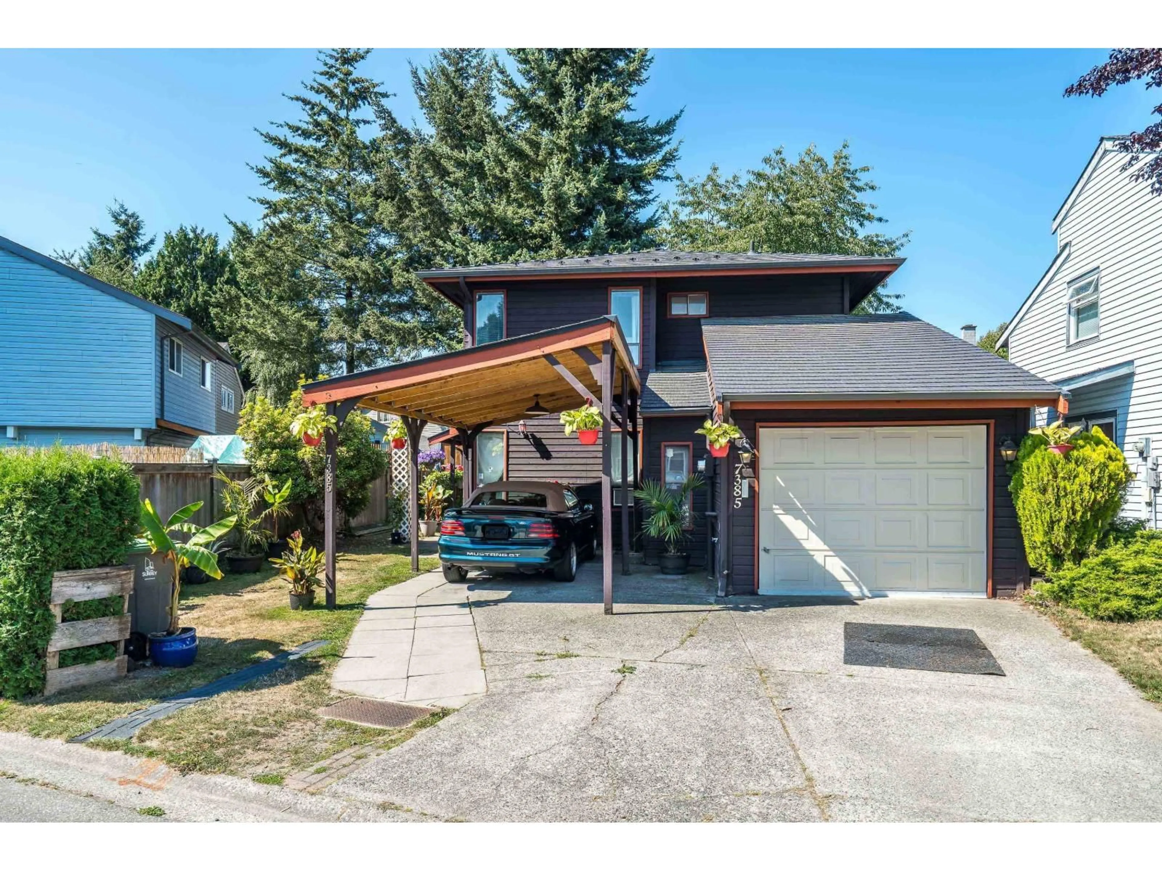 Home with vinyl exterior material, street for 7385 129 STREET, Surrey British Columbia V3W7B8