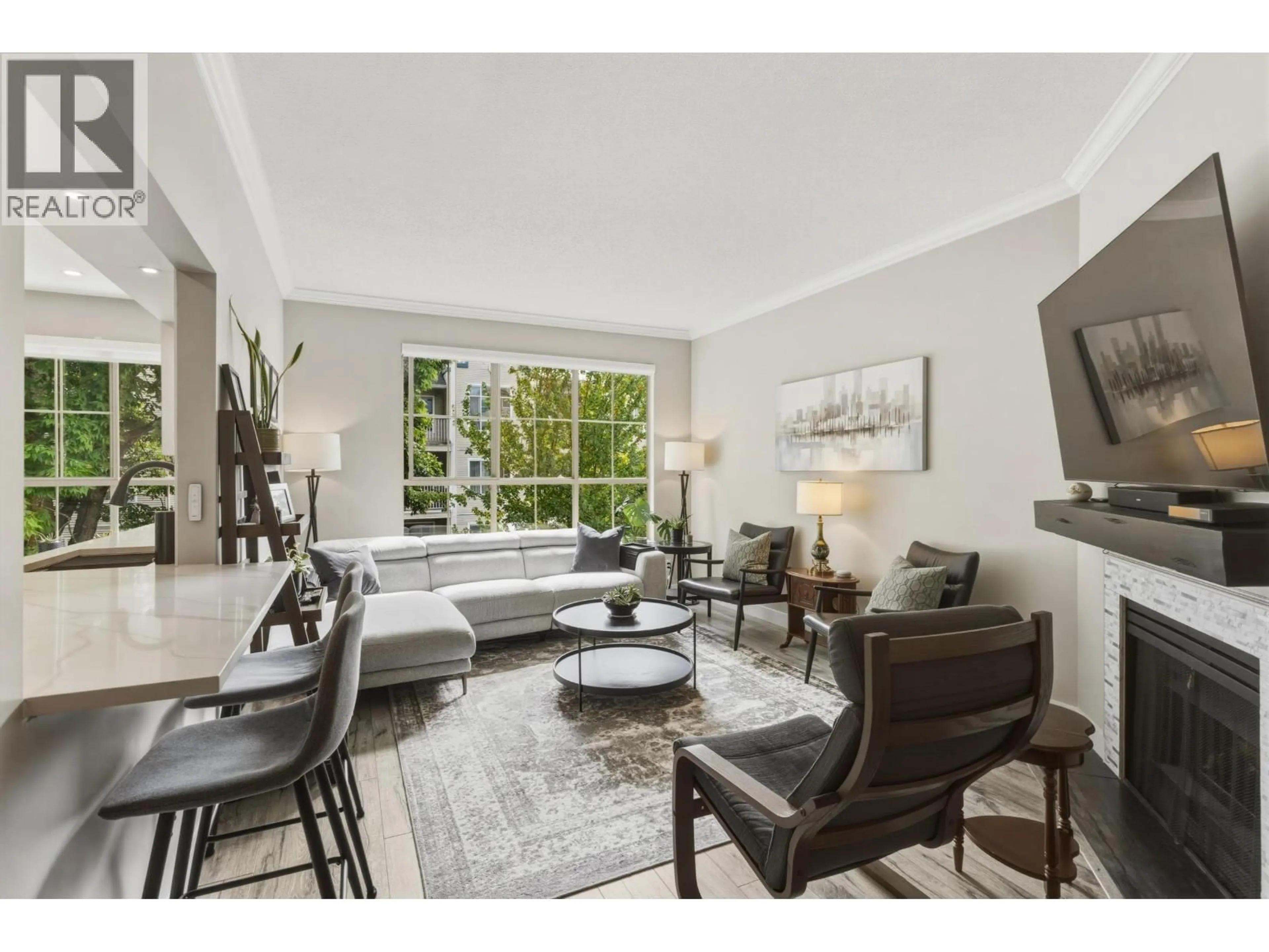 Living room with furniture, unknown for 211 - 8560 GENERAL CURRIE ROAD, Richmond British Columbia V6Y1M2