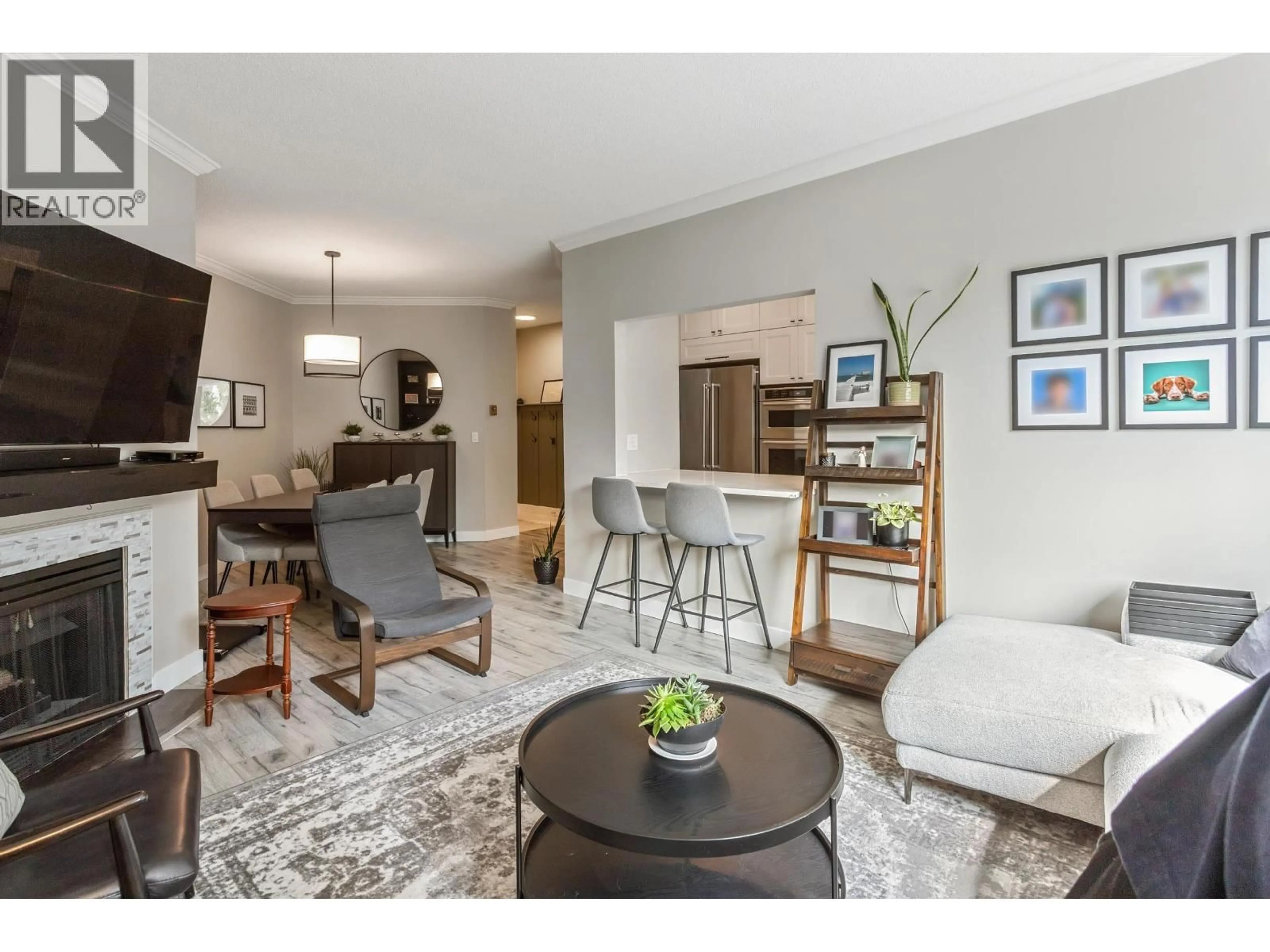 Living room with furniture, unknown for 211 - 8560 GENERAL CURRIE ROAD, Richmond British Columbia V6Y1M2