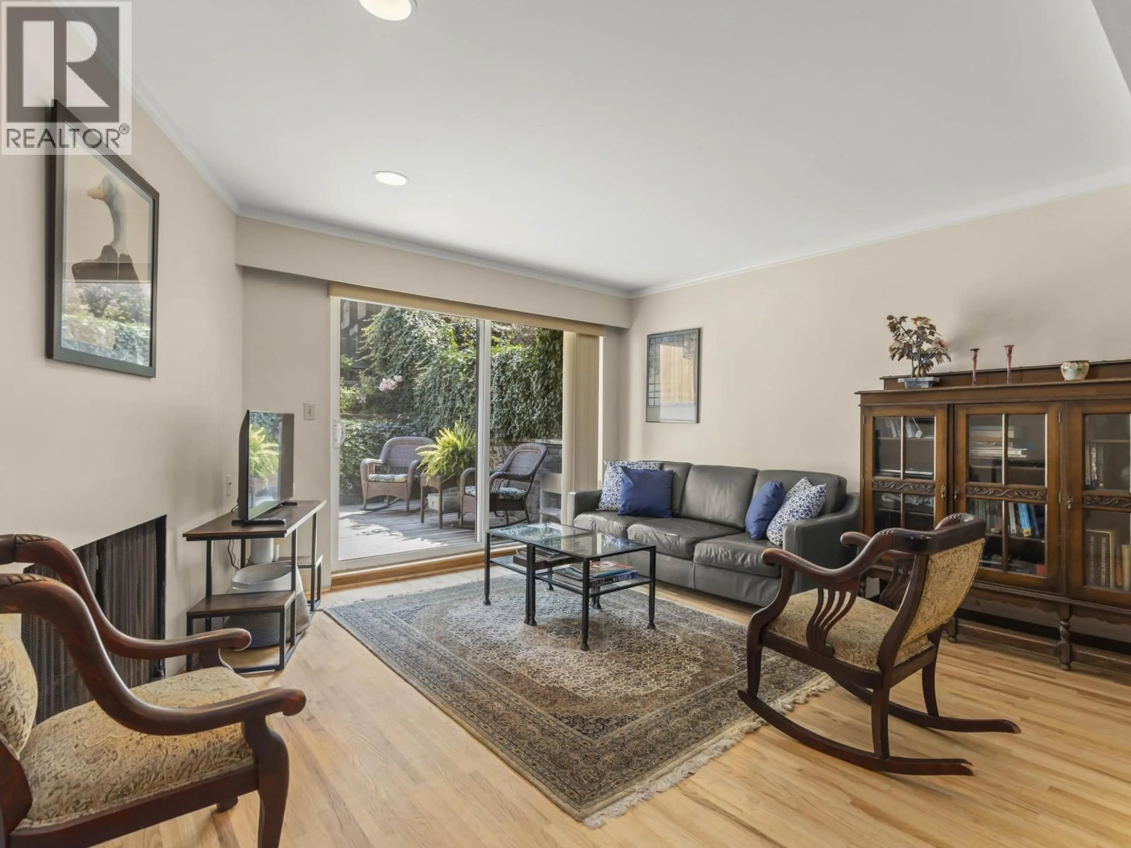 Living room with furniture, wood/laminate floor for 201 - 2028 3RD AVENUE, Vancouver British Columbia V6J1L5