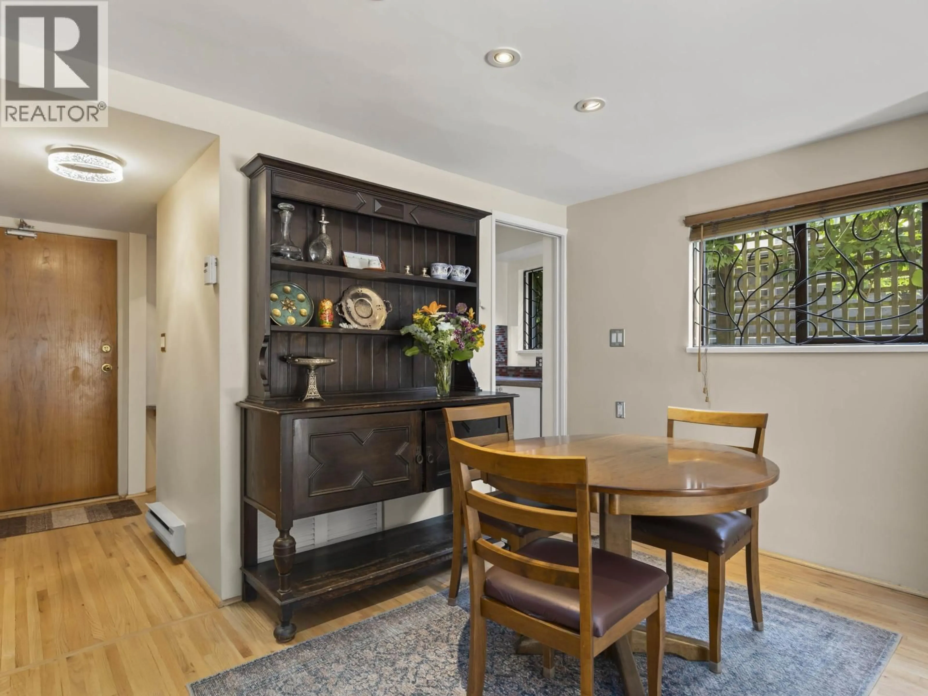 Dining room, wood/laminate floor for 201 - 2028 3RD AVENUE, Vancouver British Columbia V6J1L5