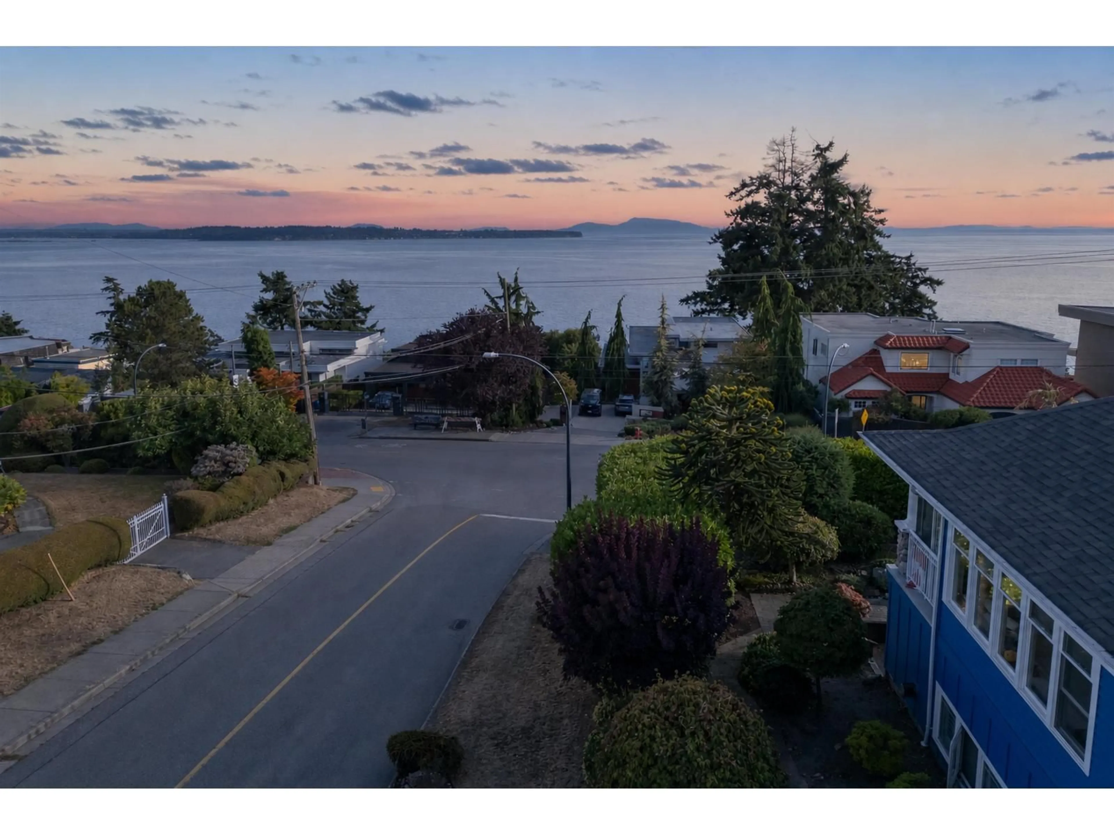 A pic from outside/outdoor area/front of a property/back of a property/a pic from drone, water/lake/river/ocean view for 14139 MARINE DRIVE, White Rock British Columbia V4B1A6