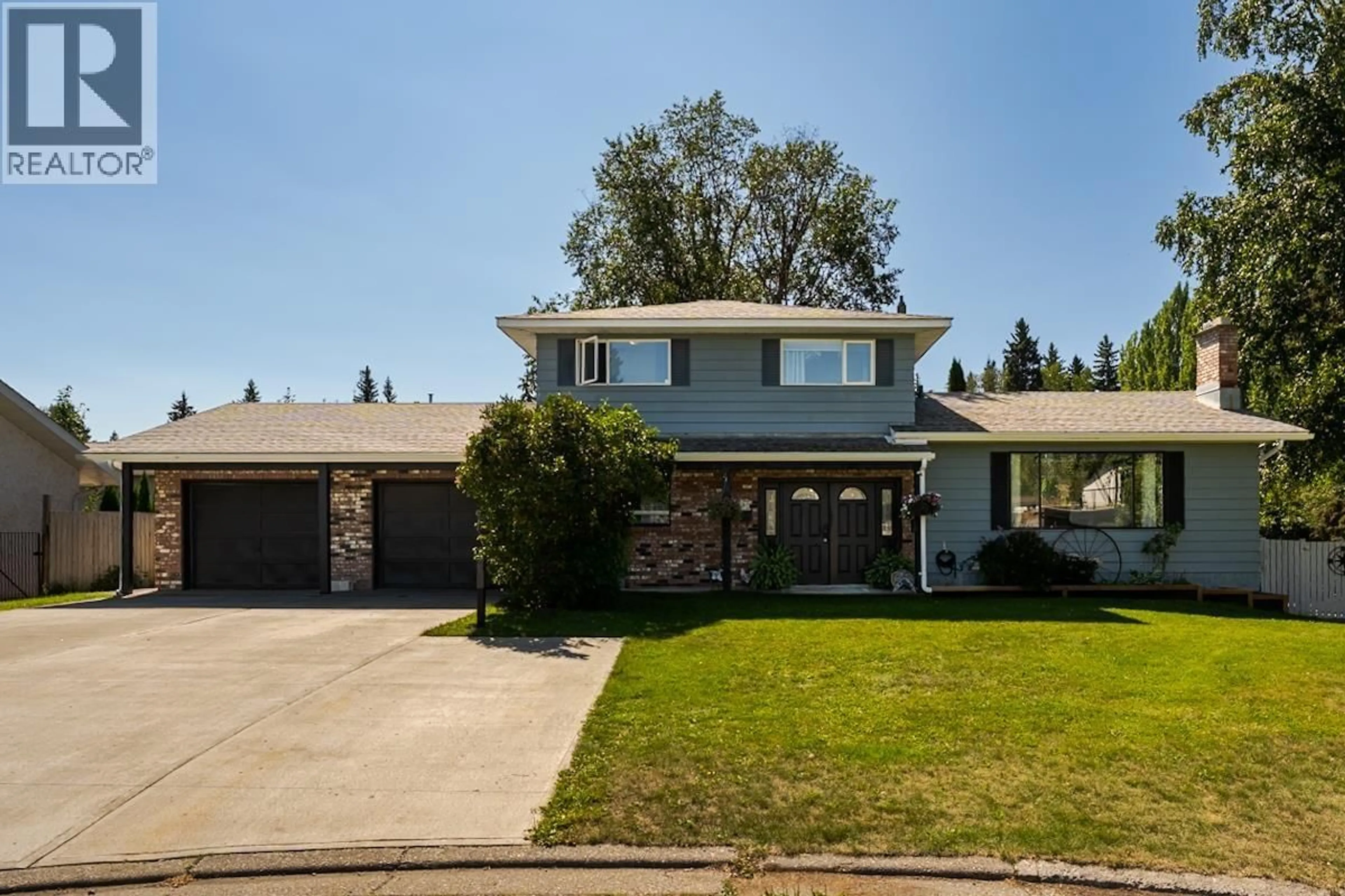 Home with vinyl exterior material, street for 1567 BUCHANAN AVENUE, Prince George British Columbia V2L4X8