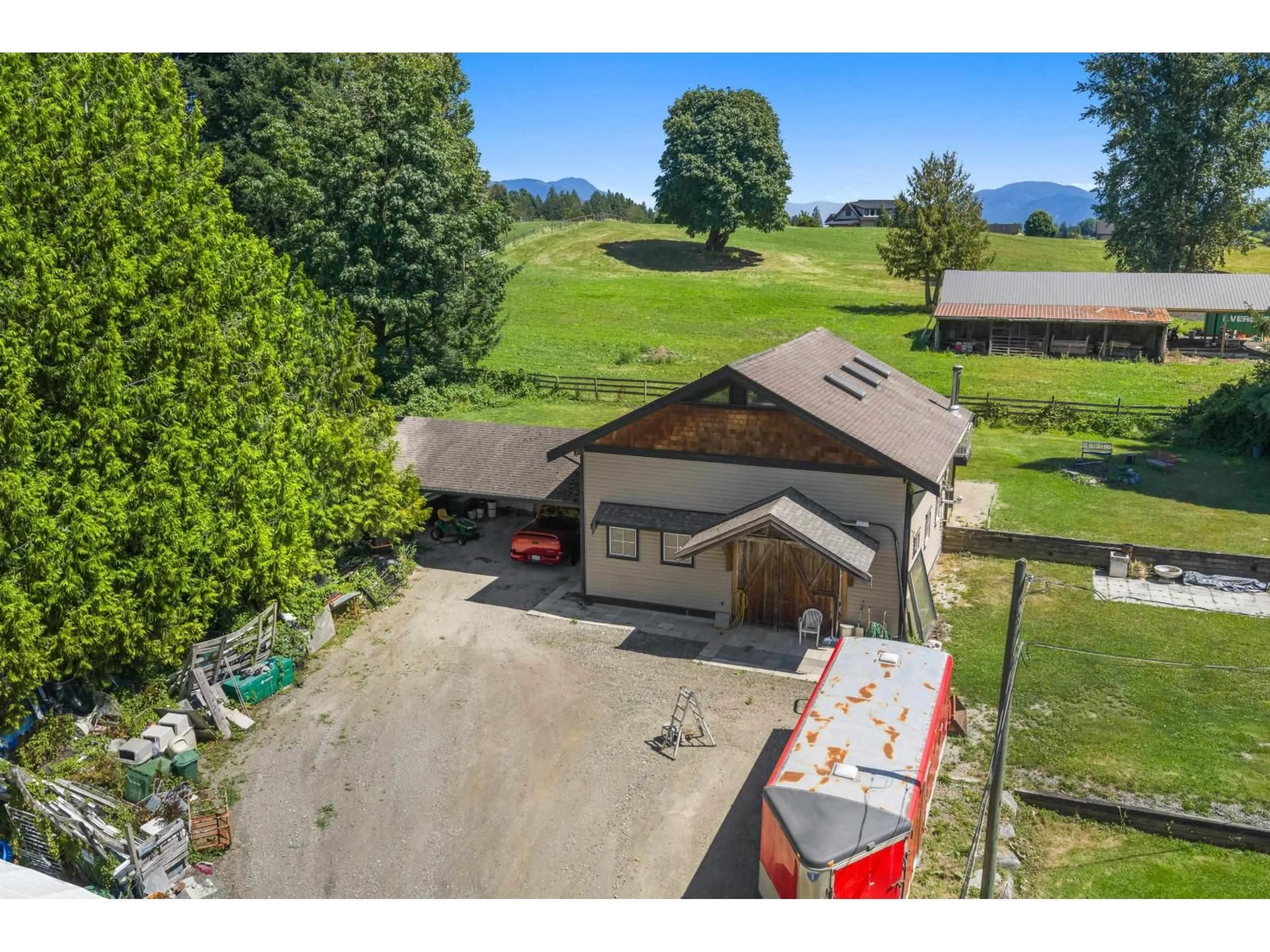 A pic from outside/outdoor area/front of a property/back of a property/a pic from drone, mountain view for 6050 LECLAIR STREET, Abbotsford British Columbia V4X2C9