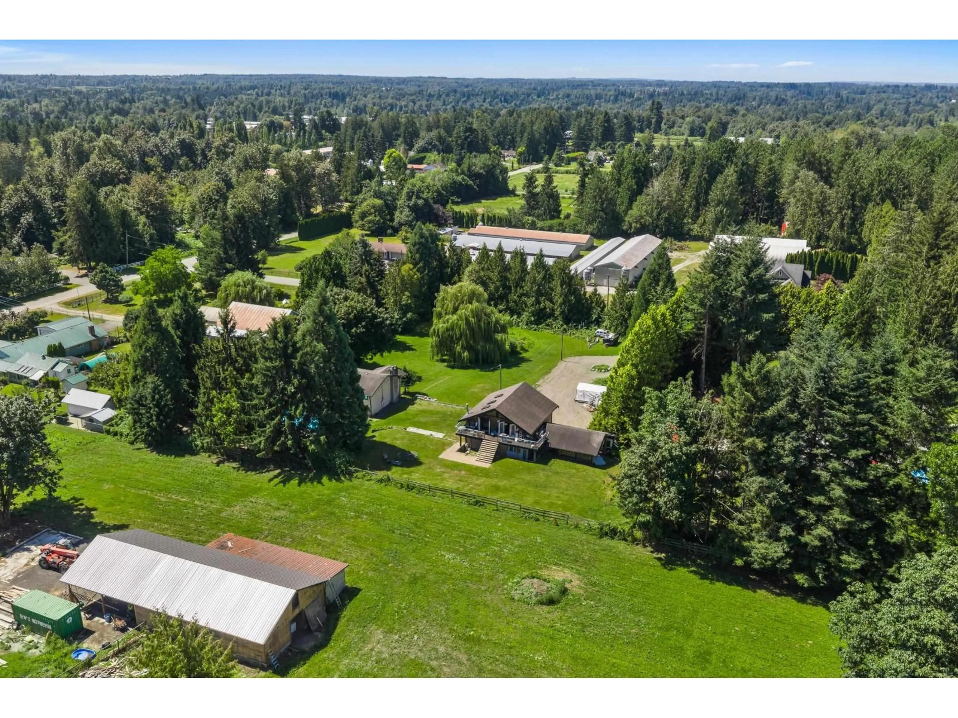 A pic from outside/outdoor area/front of a property/back of a property/a pic from drone, forest/trees view for 6050 LECLAIR STREET, Abbotsford British Columbia V4X2C9