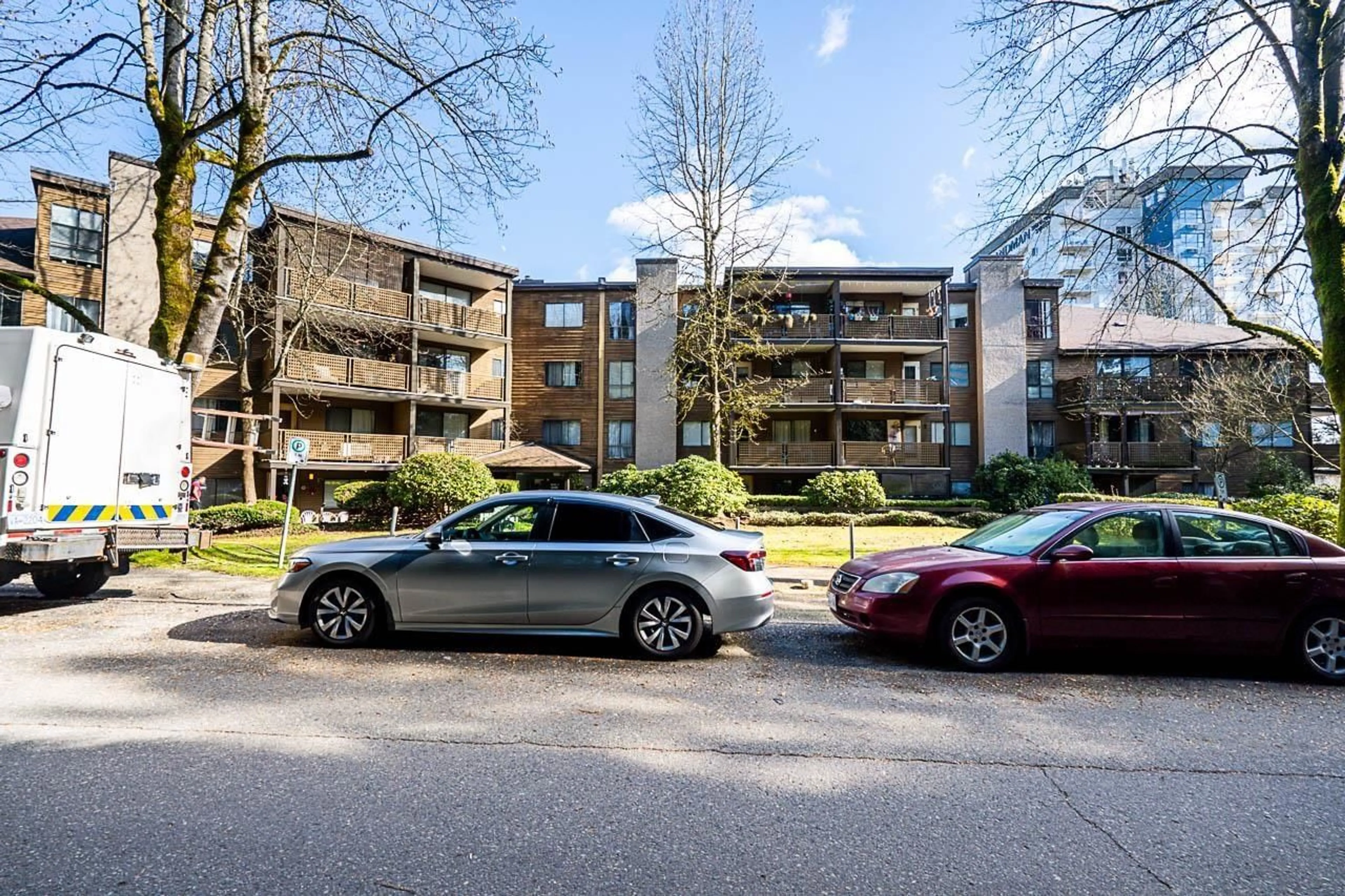 A pic from outside/outdoor area/front of a property/back of a property/a pic from drone, street for 106 - 10644 151A STREET, Surrey British Columbia V3R8R3