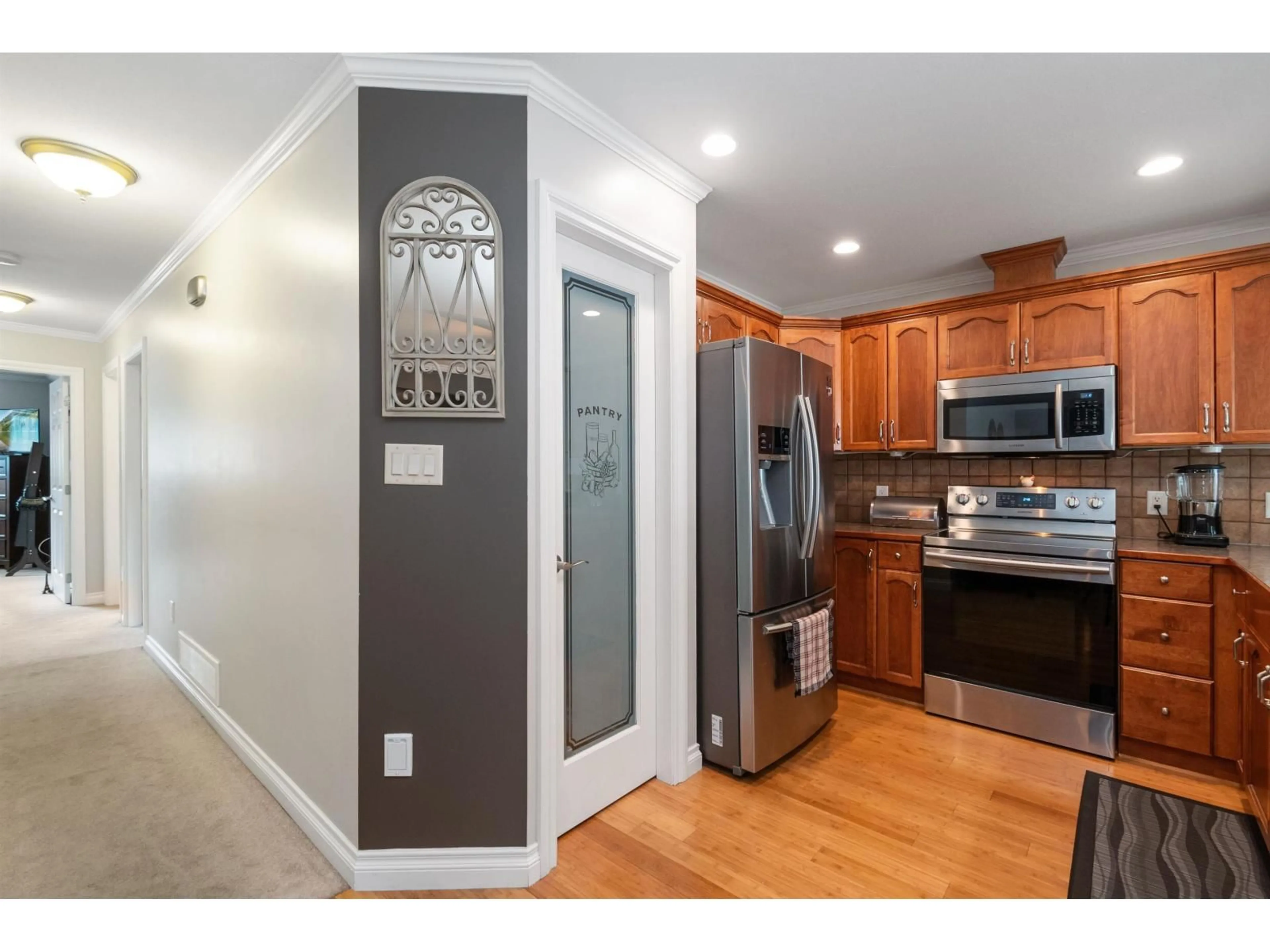 Open concept kitchen, wood/laminate floor for 66022 PARK AVENUE, Hope British Columbia V0X1L1